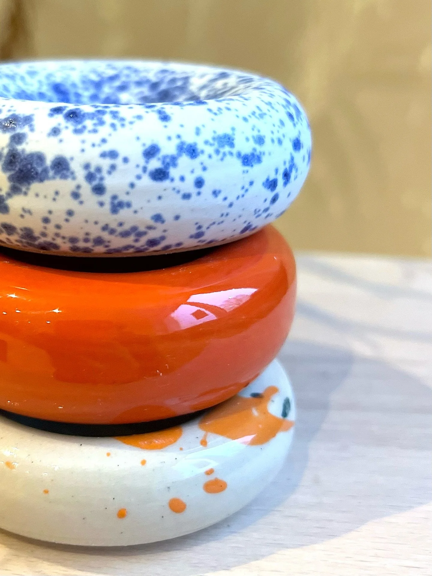 A splash of orange, a sprinkle of blue &mdash; tiny handmade joys 💙🧡
.
..
.
.
.
.
.
.
#ceramics #handmadeceramics #pottery #ceramicart #ceramicstudio #wheelthrowing #handbuiltceramics #ceramicscommunity #candleholder #homedecor #interiorstyling #ta