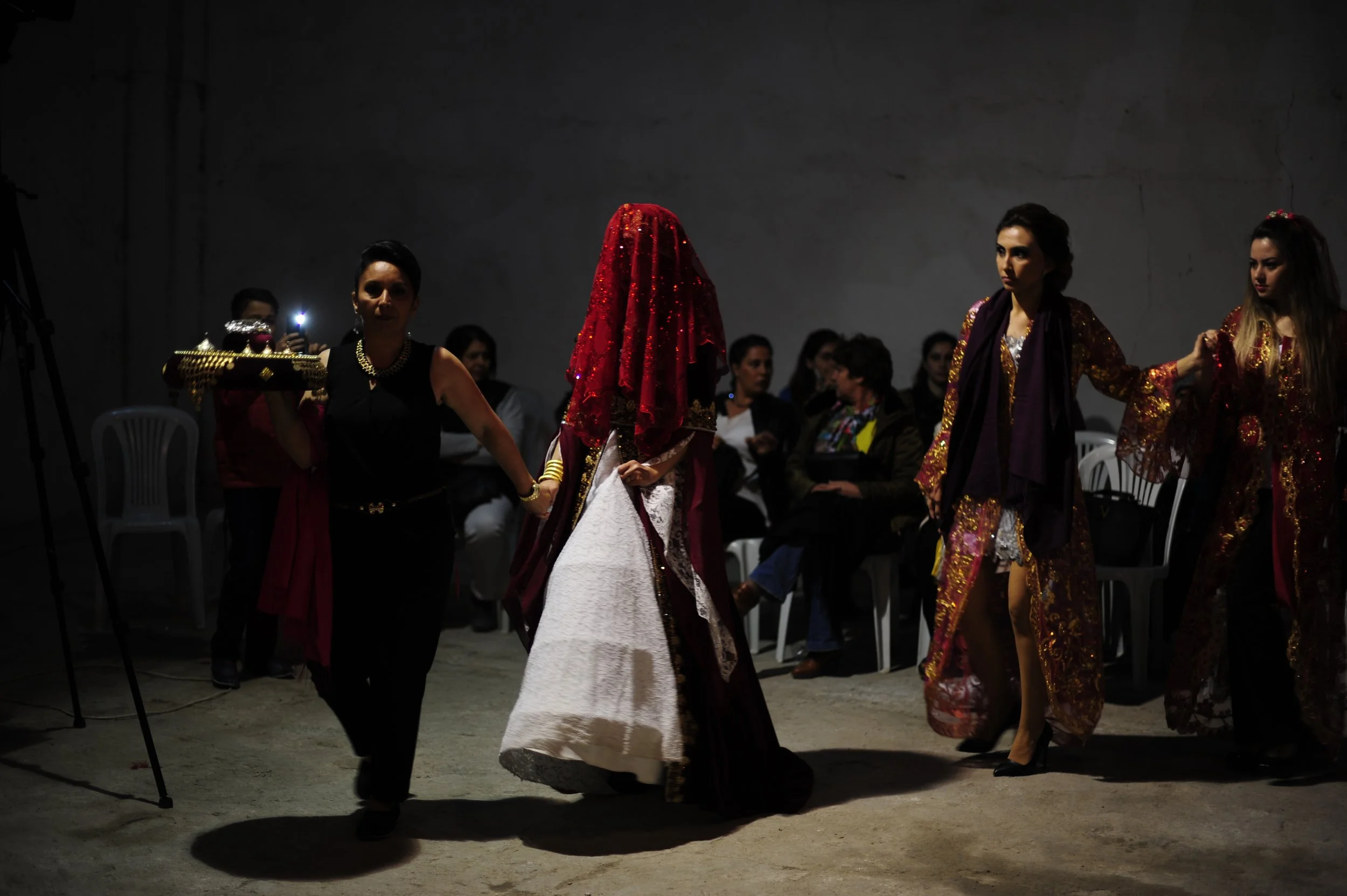Henna party Erdi-Turkey: Mother of the bride leading her into the wedding hall.