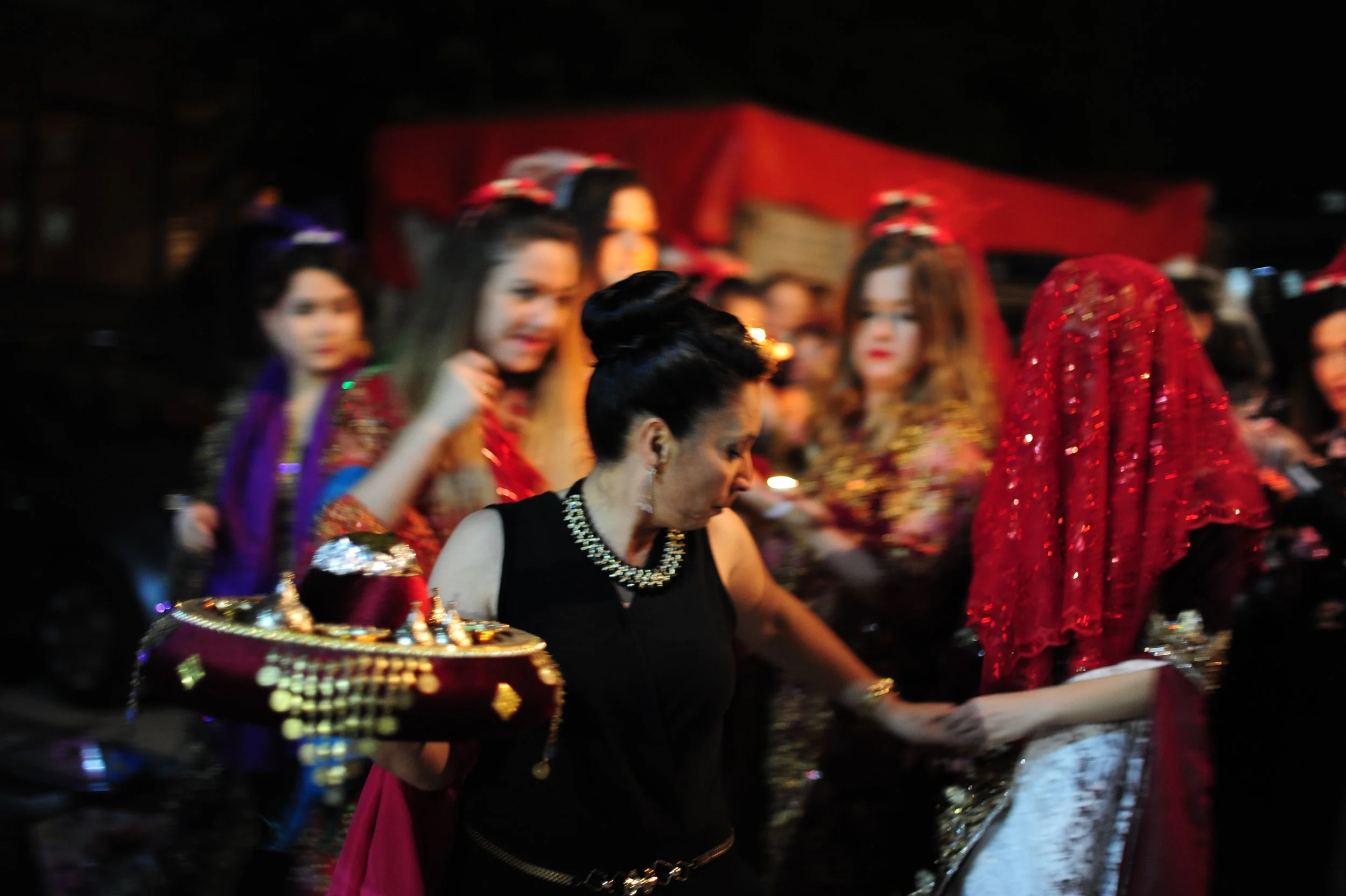 Henna party Erdi-Turkey: Mother of the bride leading her into the wedding hall.