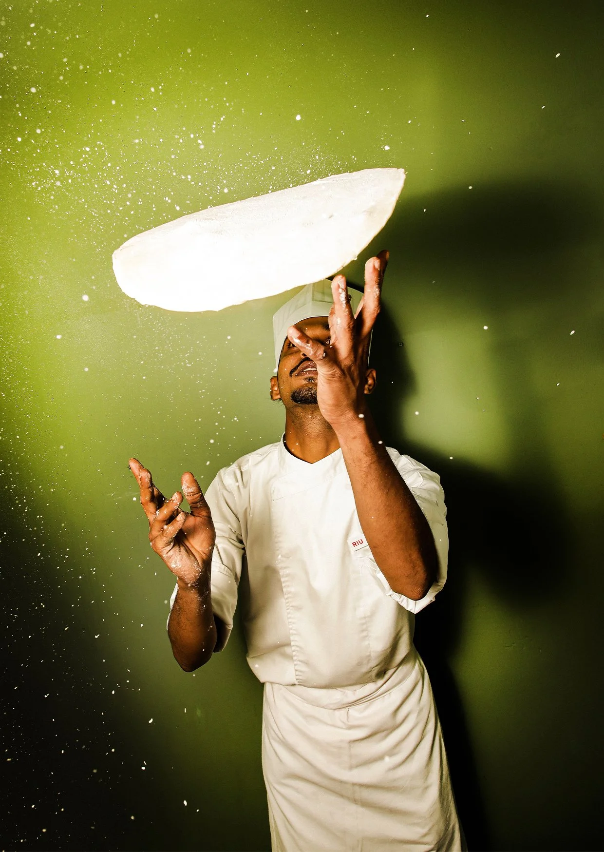 Cook making pizza dough.jpg