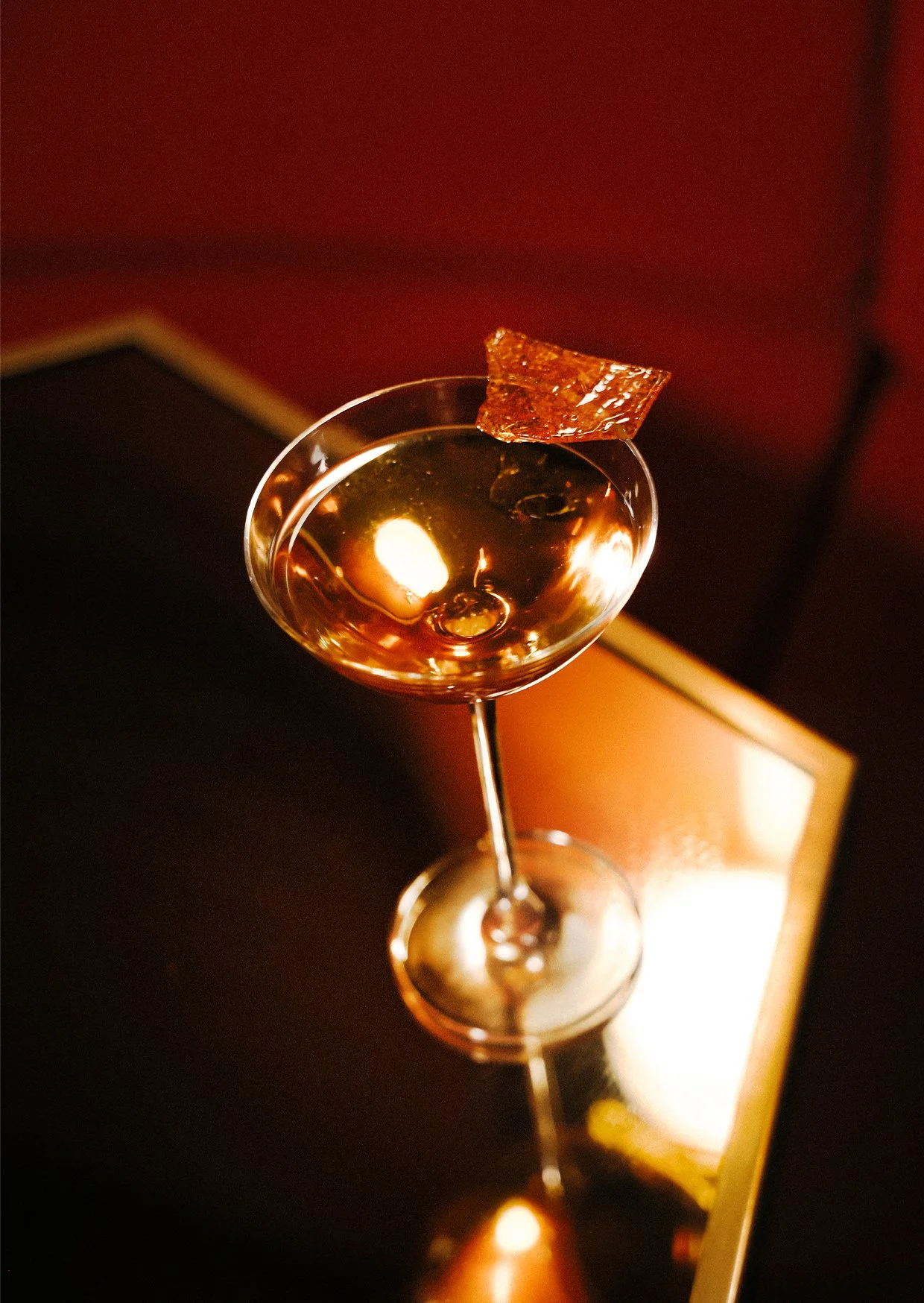 Nice glass of cocktail in elegant bar.jpg