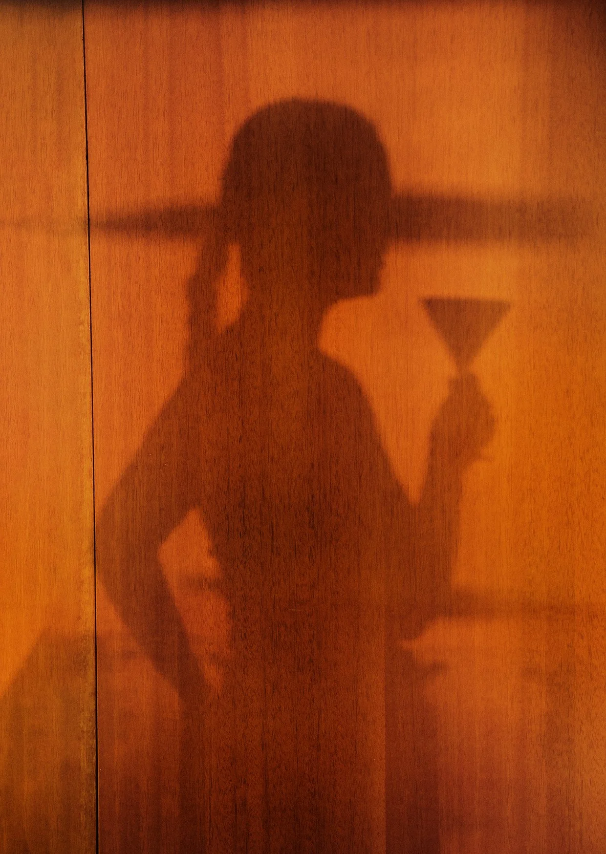 shadow of girl's silhouette having a drink.jpg