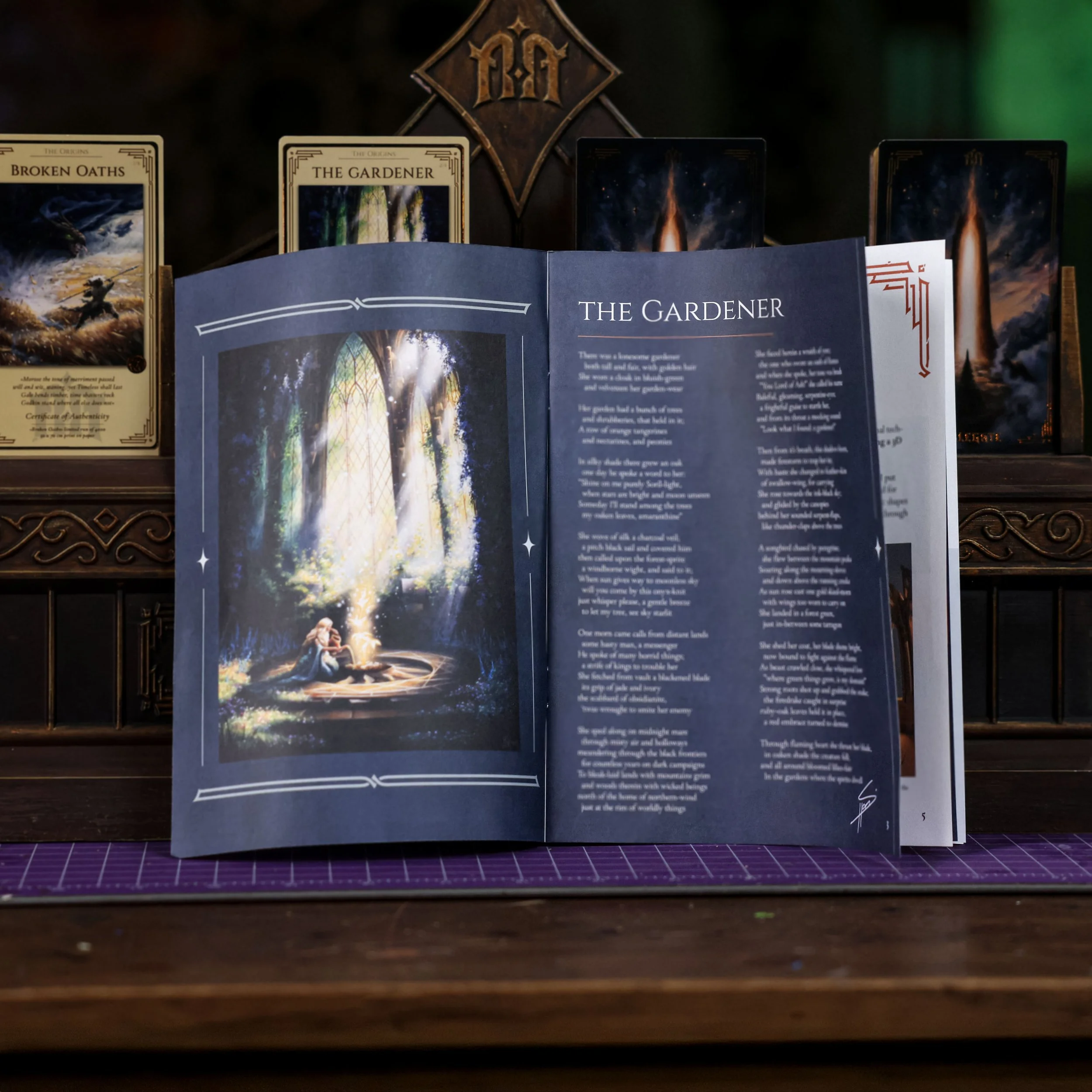 An open book with the title 'The Gardener' and illustrated artwork of a girl sitting by a glowing magical object in a lush, enchanted forest with sunlight streaming through tall trees. In the background, tarot-like cards are displayed, including one called 'Broken Oaths' and another 'The Gardener'.