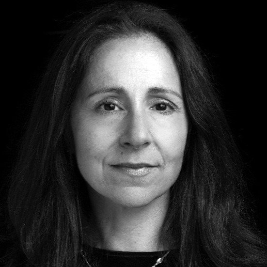 A black and white headshot of Photo Oxford Director Katy Barron