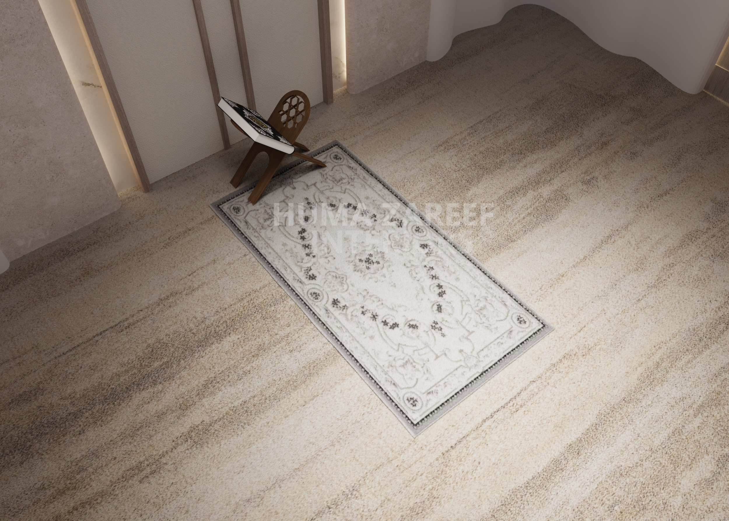 A beige area rug with black floral and geometric patterns on a light wood floor. A small wooden chair with an open backrest and a black-and-white magazine resting on it is positioned next to the wall.