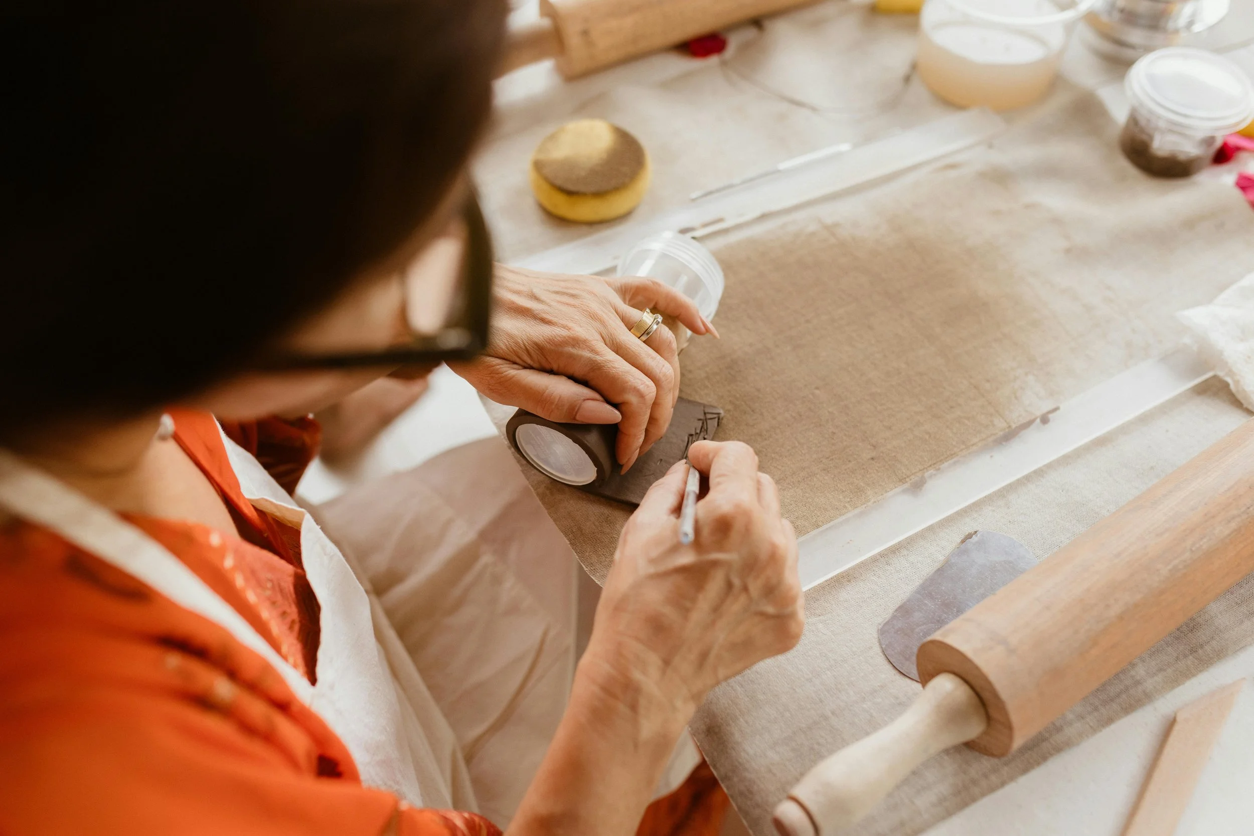 business owner crafting handmade products