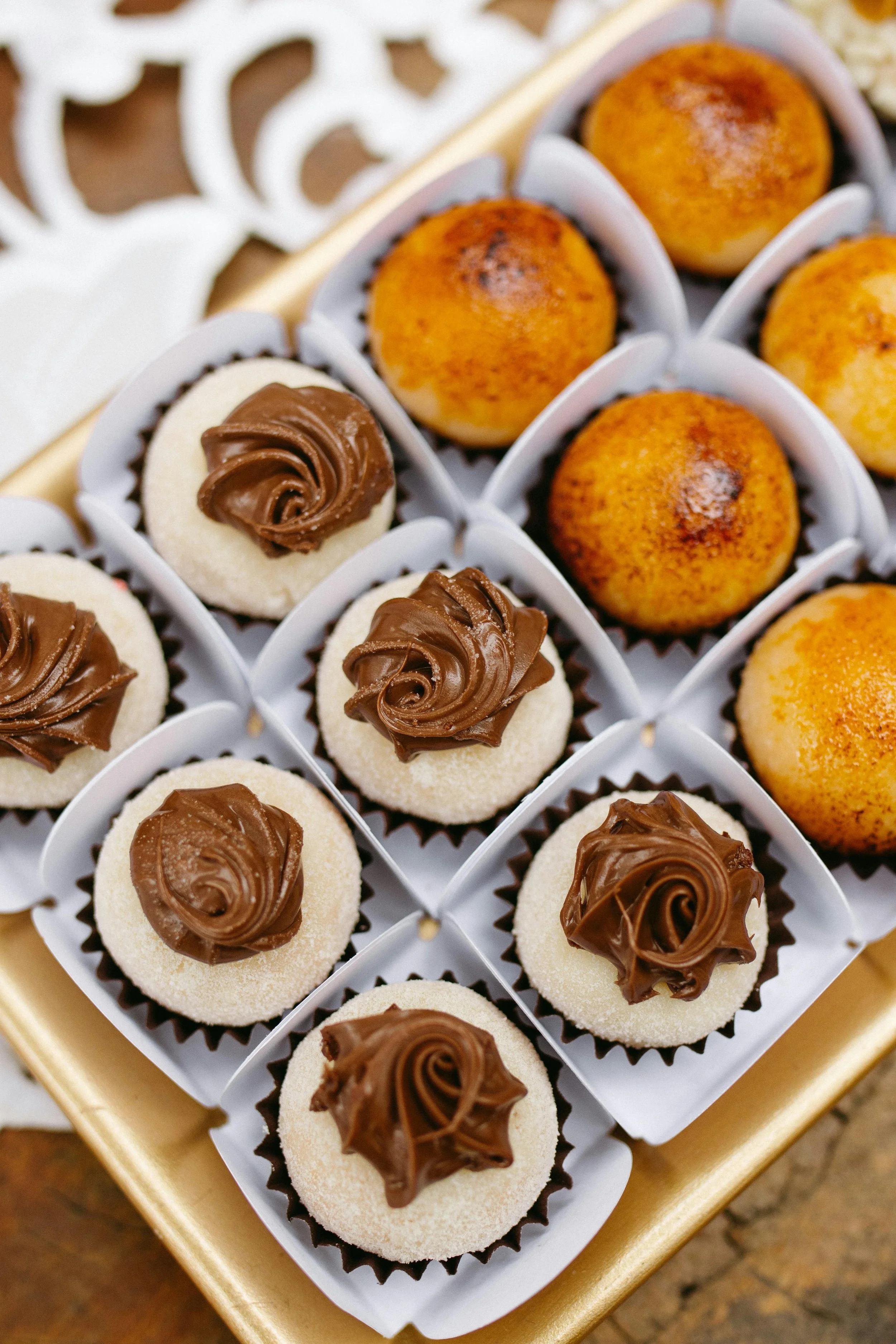 freshly baked cupcakes in a tray