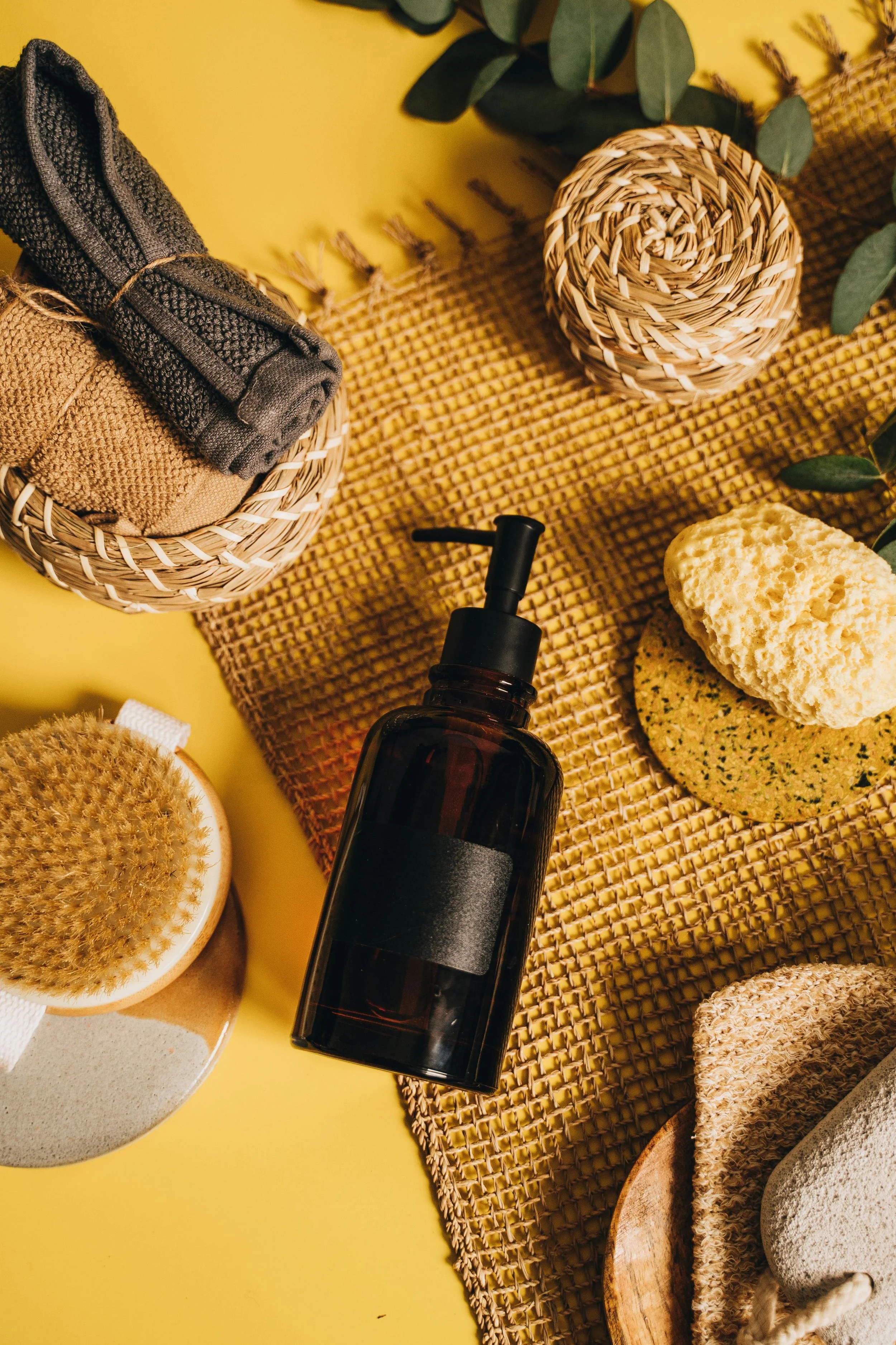 product against yellow background with natural materials surrounding