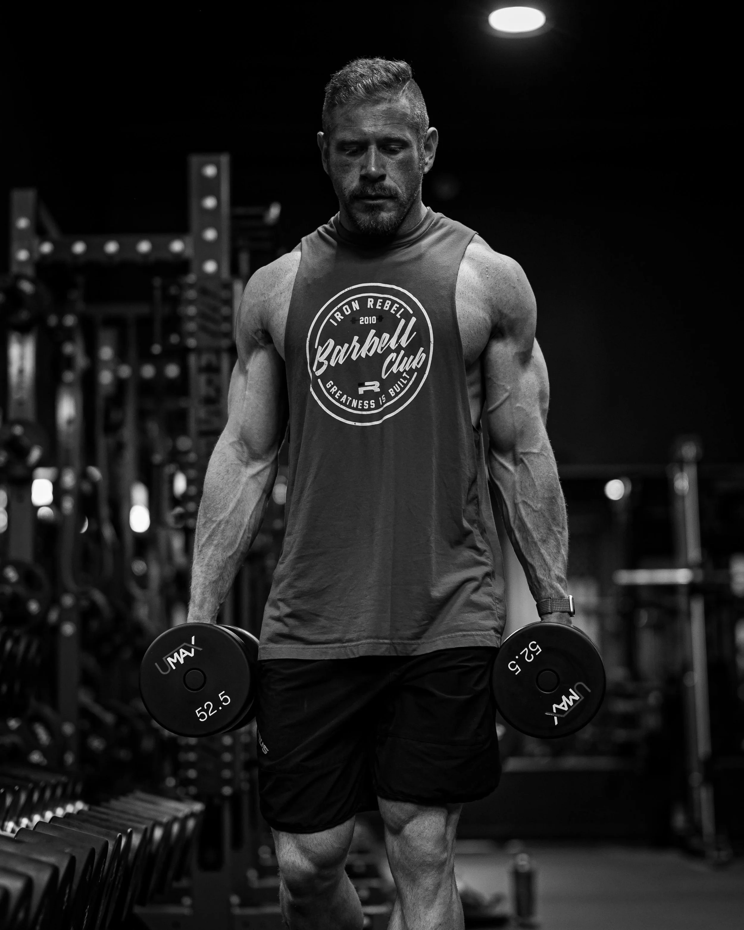 black and white image of fitness workout in the gym