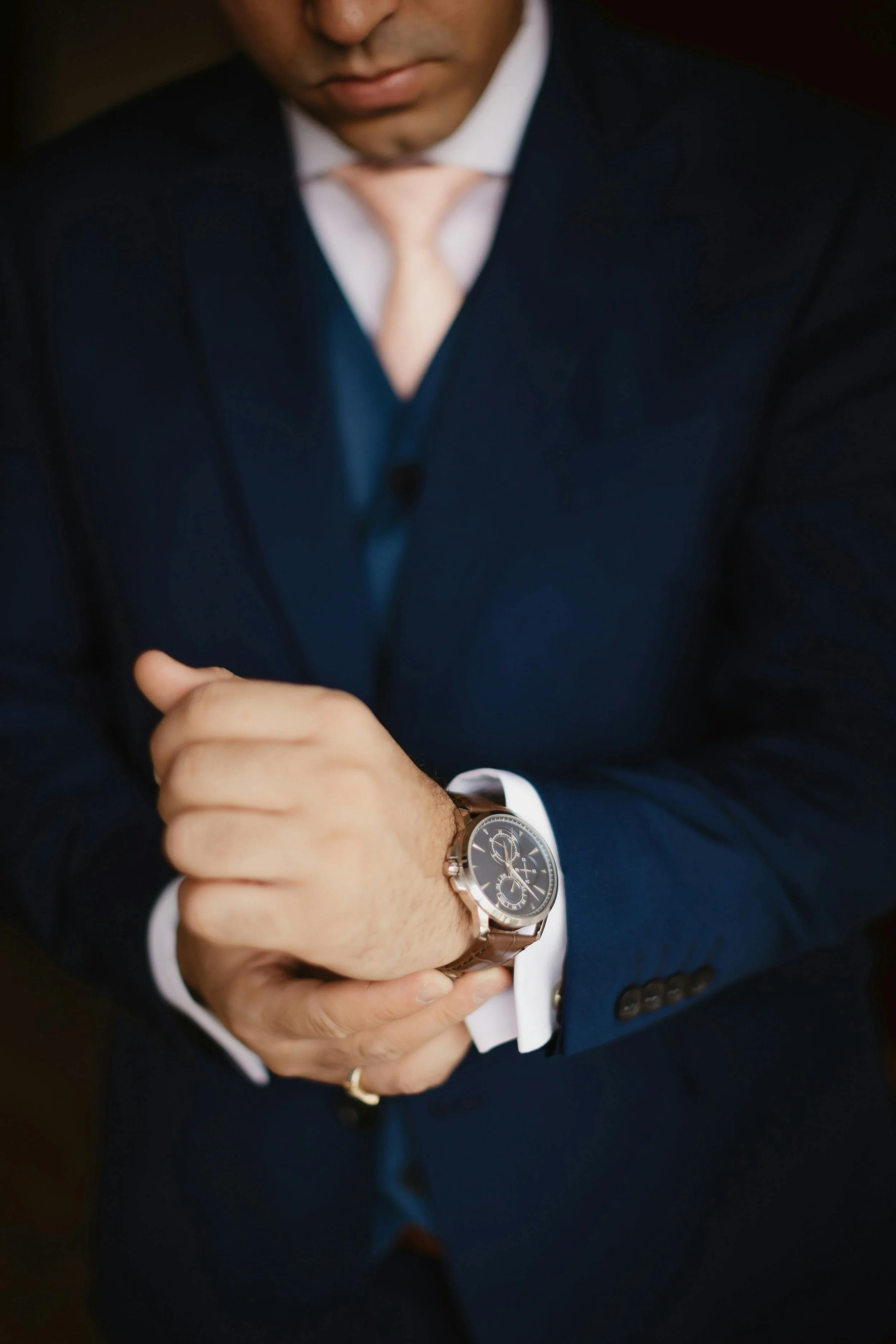 groom getting read for wedding day