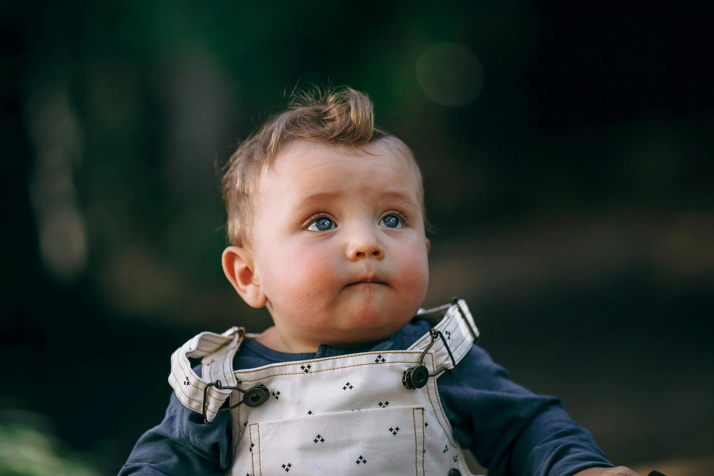 little boy looking sad