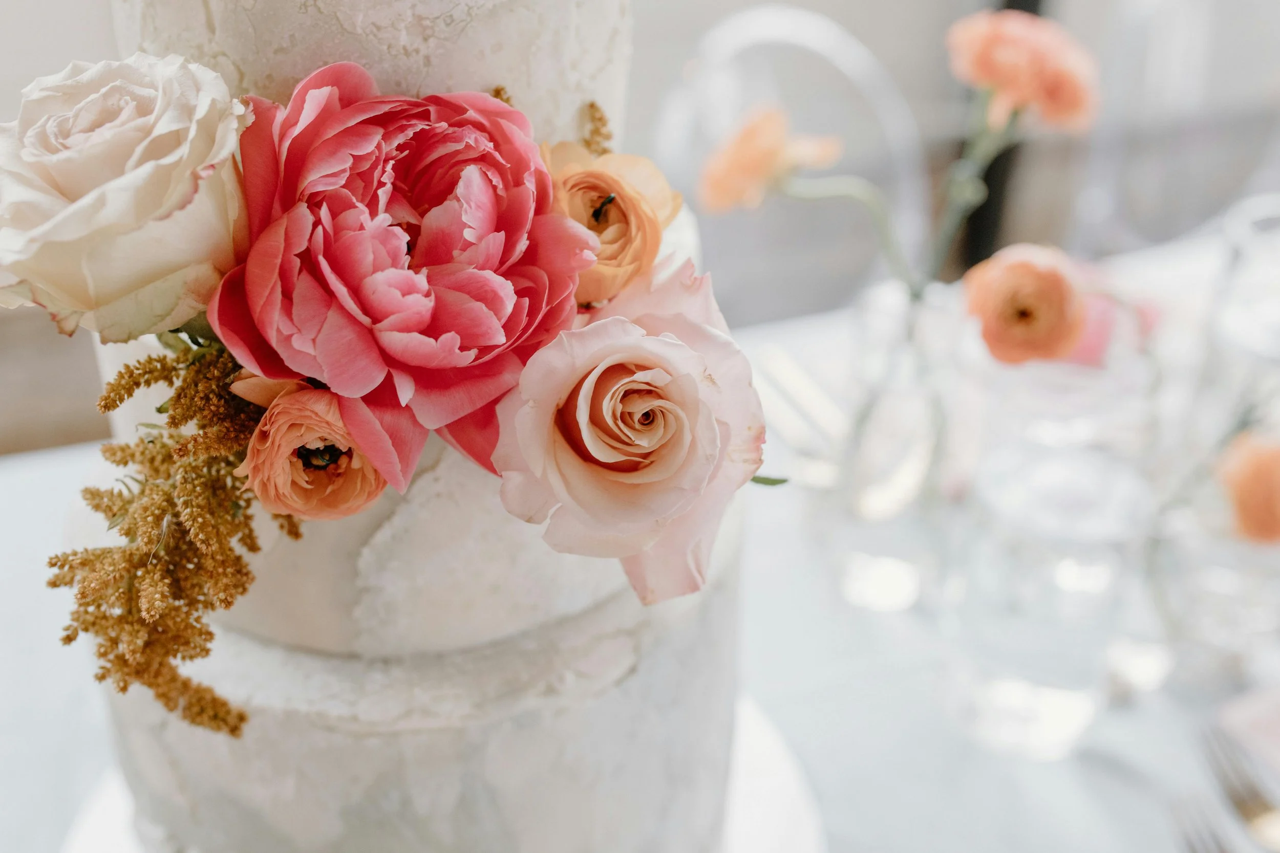 wedding cake with pink flowers