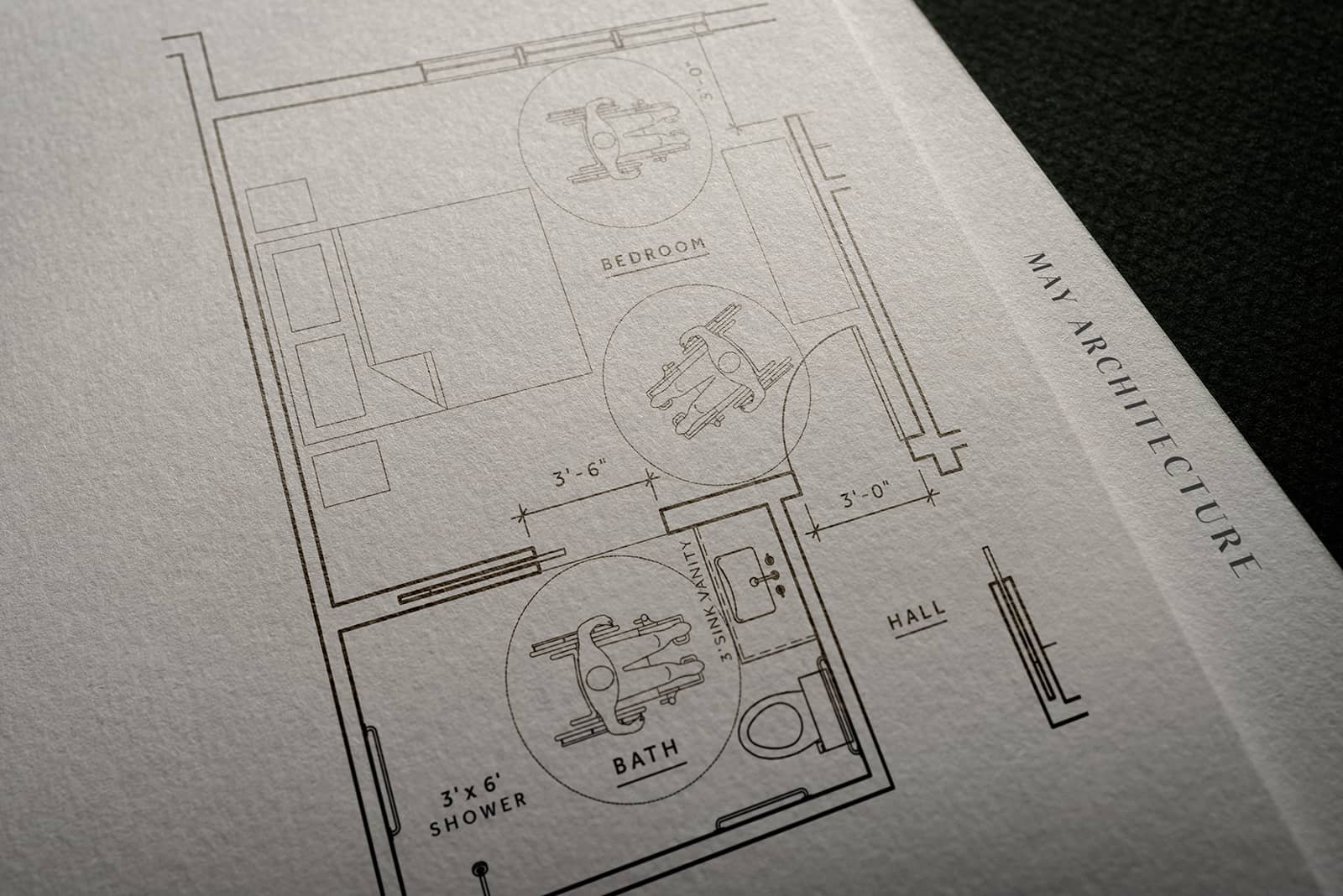 Architectural blueprint of a bedroom, bathroom, and hall with measurements showing space for wheelchair movement and aging in place
