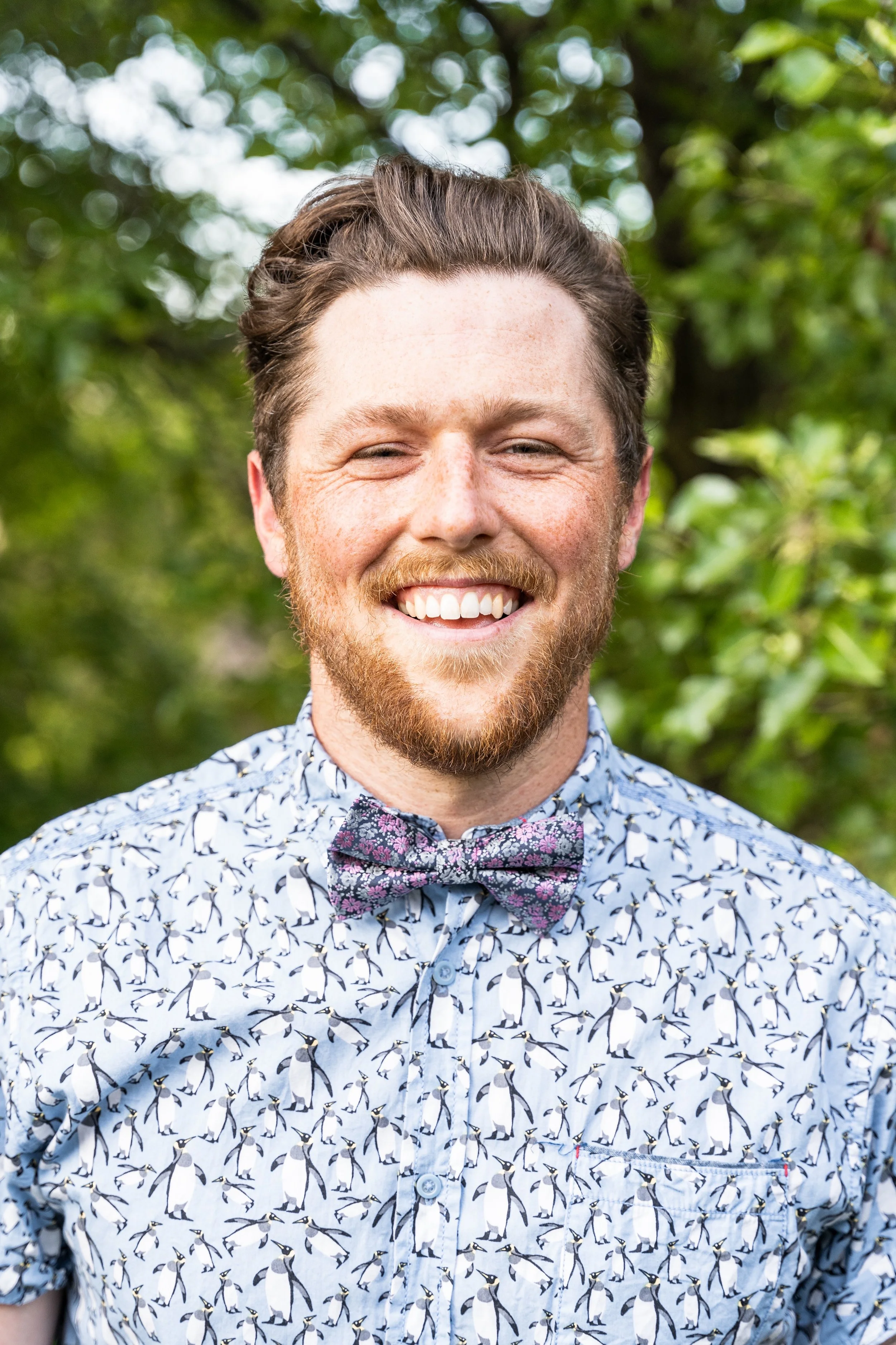 Tyler Loveman smiling for headshot