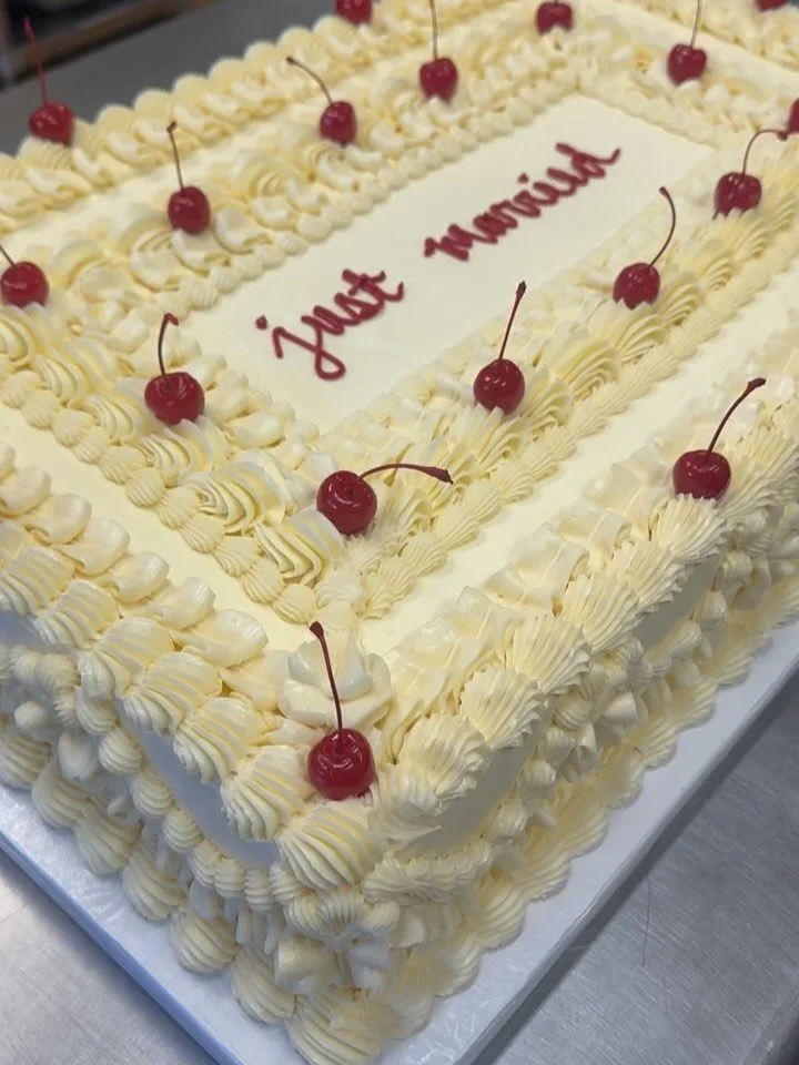 BIG N&rsquo; Beautiful! 🍒 Massive chocolate sheet cake with raspberry filling and vanilla Swiss meringue buttercream, complete with cherries on top! We loved making this cake and getting a work out delivering it. 💪 Expertly decorated and constructe