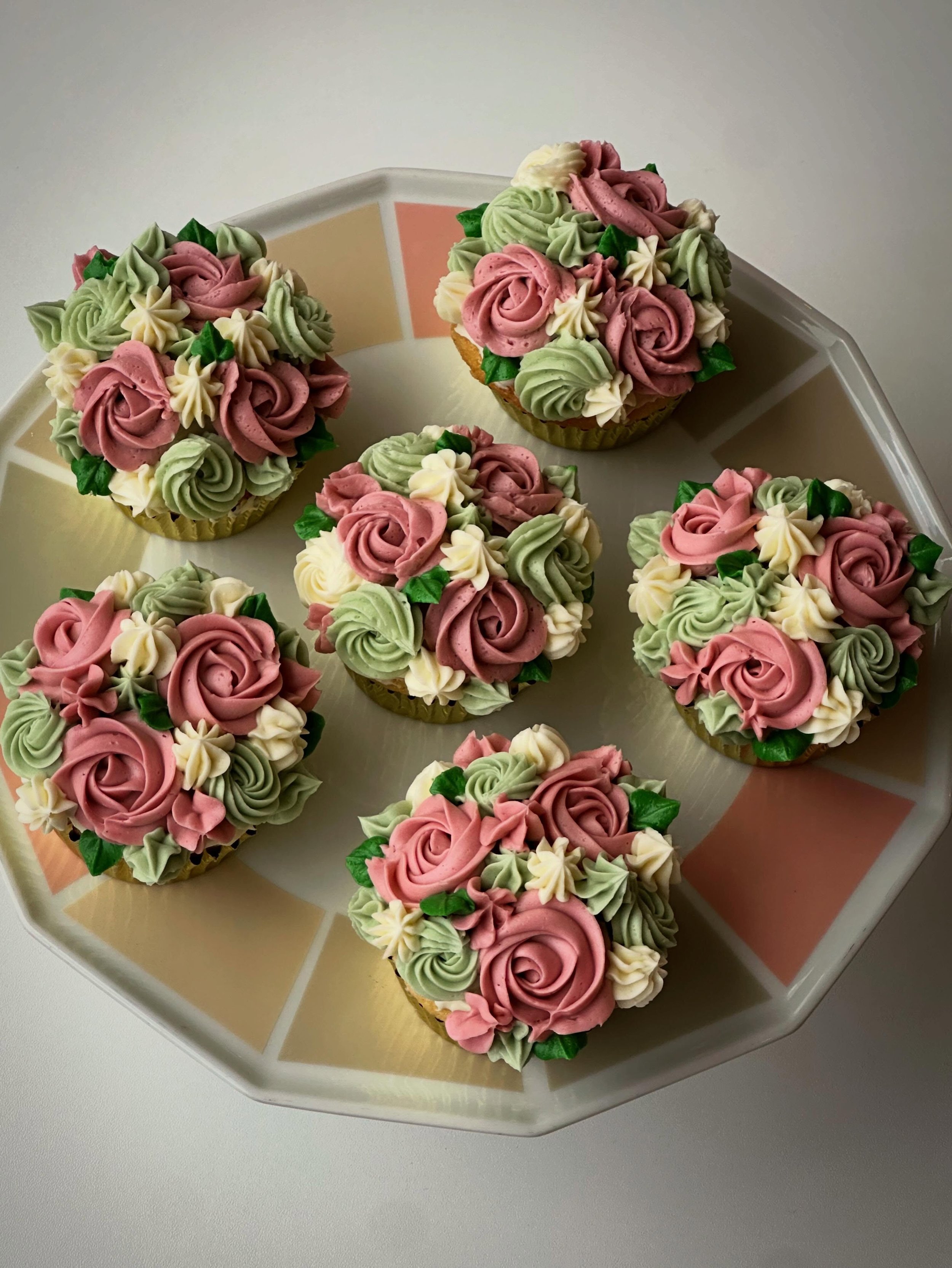 Happy Memorial Day weekend! ☔️ Channeling these flowery piped cupcakes today to let you know we&rsquo;re 💐 open regular hours, 10-5 all weekend and Monday. See you in the shop! 💘