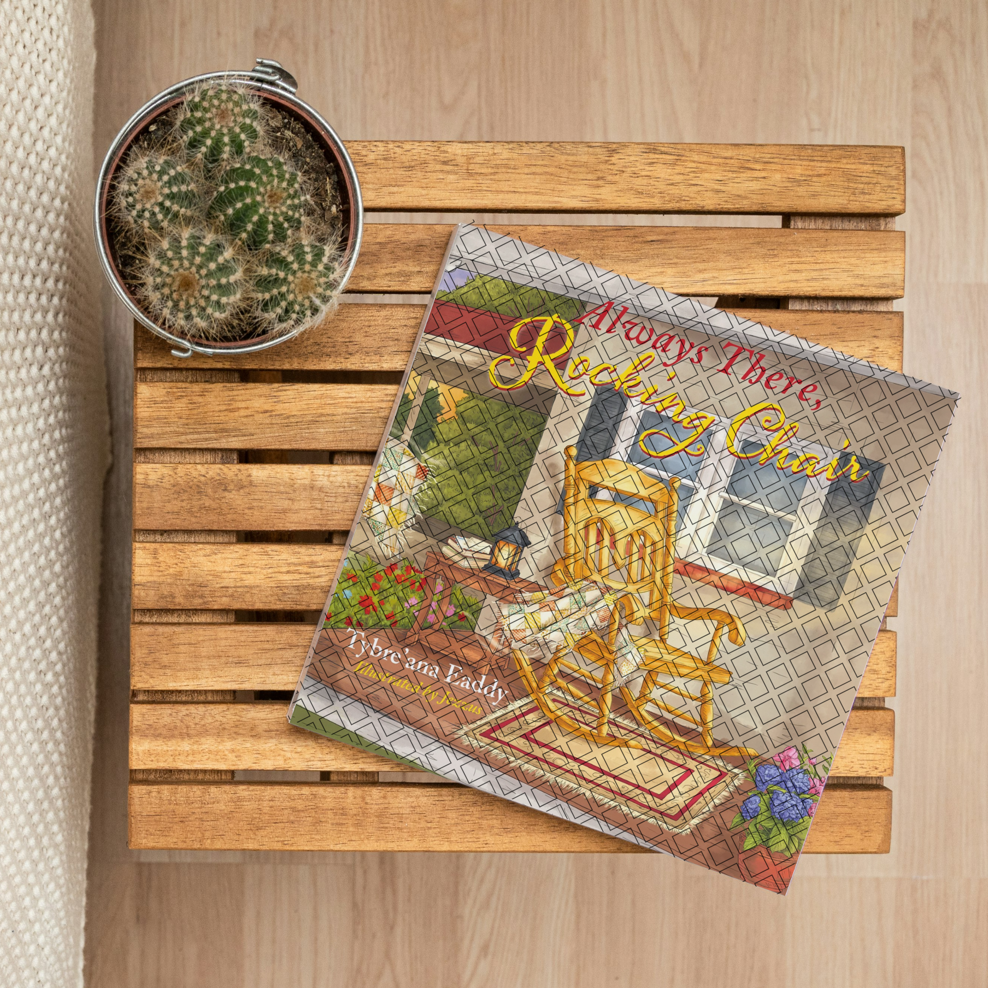 A book titled "Always There: Reach My Chair" resting on a wooden slatted table, with a potted cactus plant nearby.