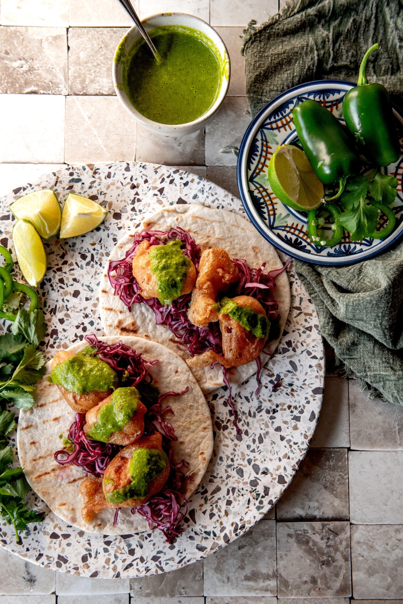 Beer Battered Cod Tacos with Pickled Cabbage and Jalapeño Sauce