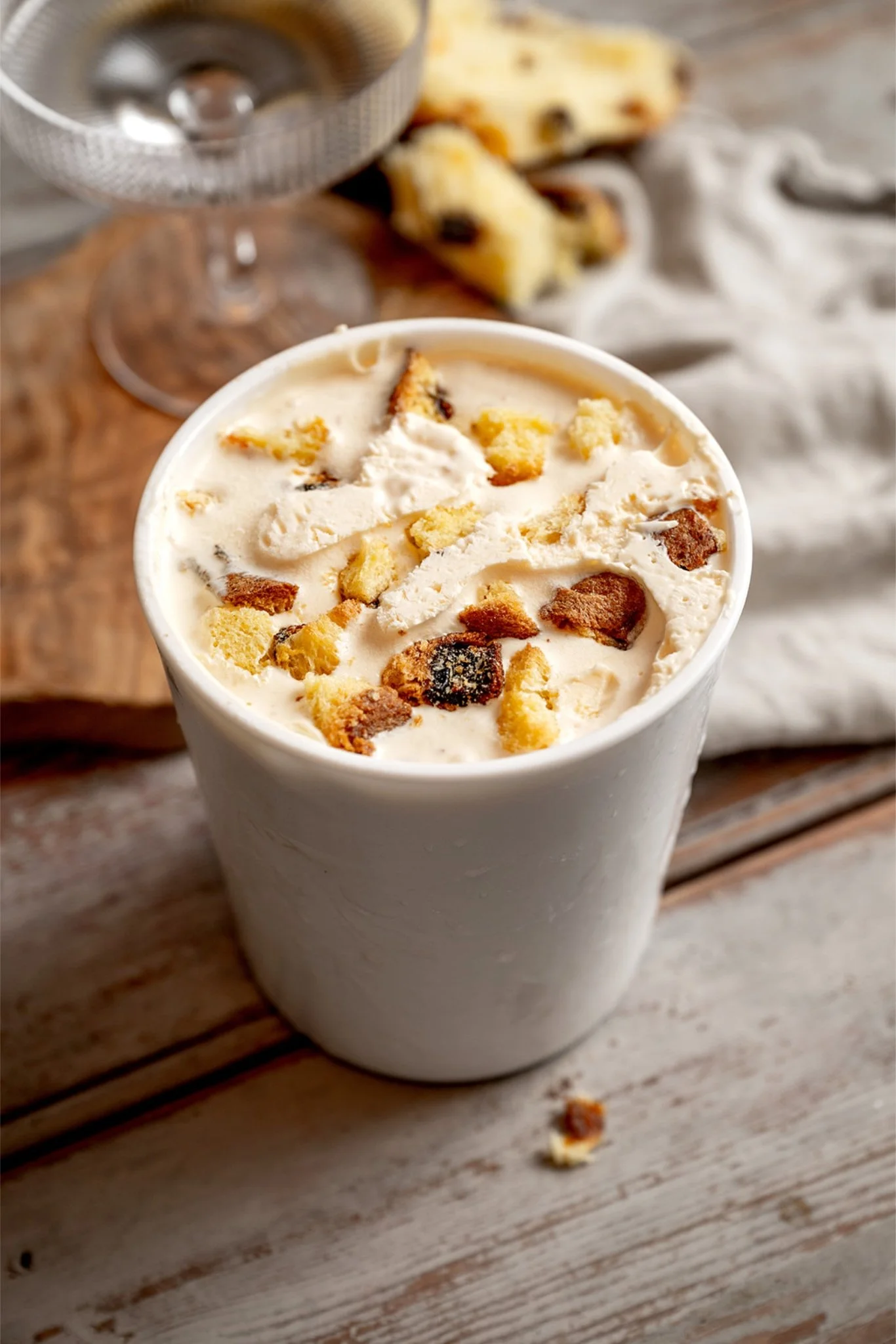 Close up of panettone ice cream showing texture with visible toasted panettone pieces throughout