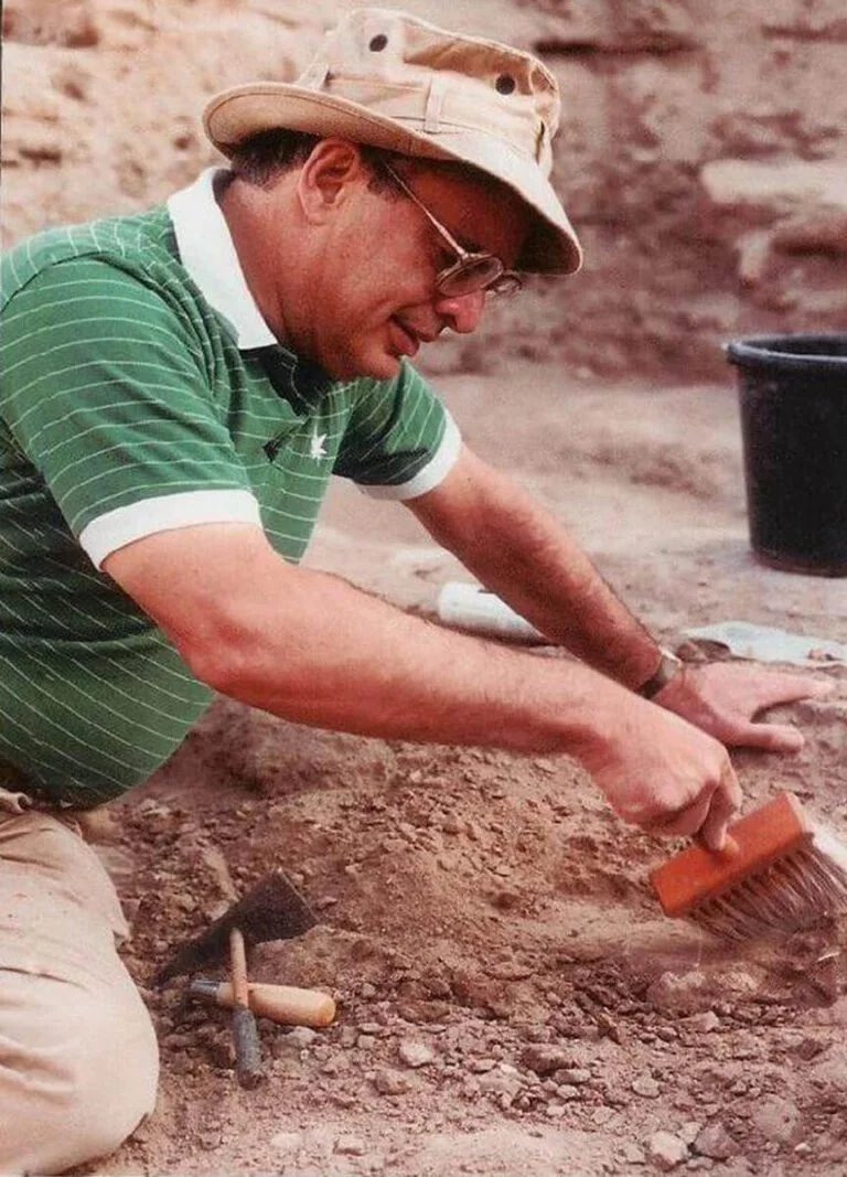 Leon Levy digging at an archeological site