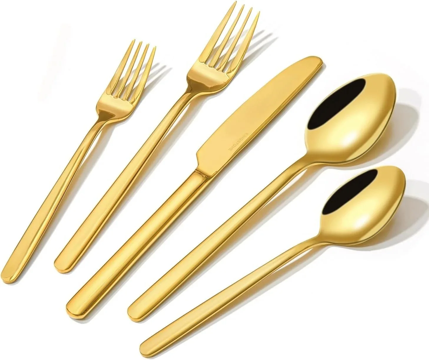 Set of four gold-colored utensils, including two forks, one knife, and two spoons, arranged in a row on a white background.