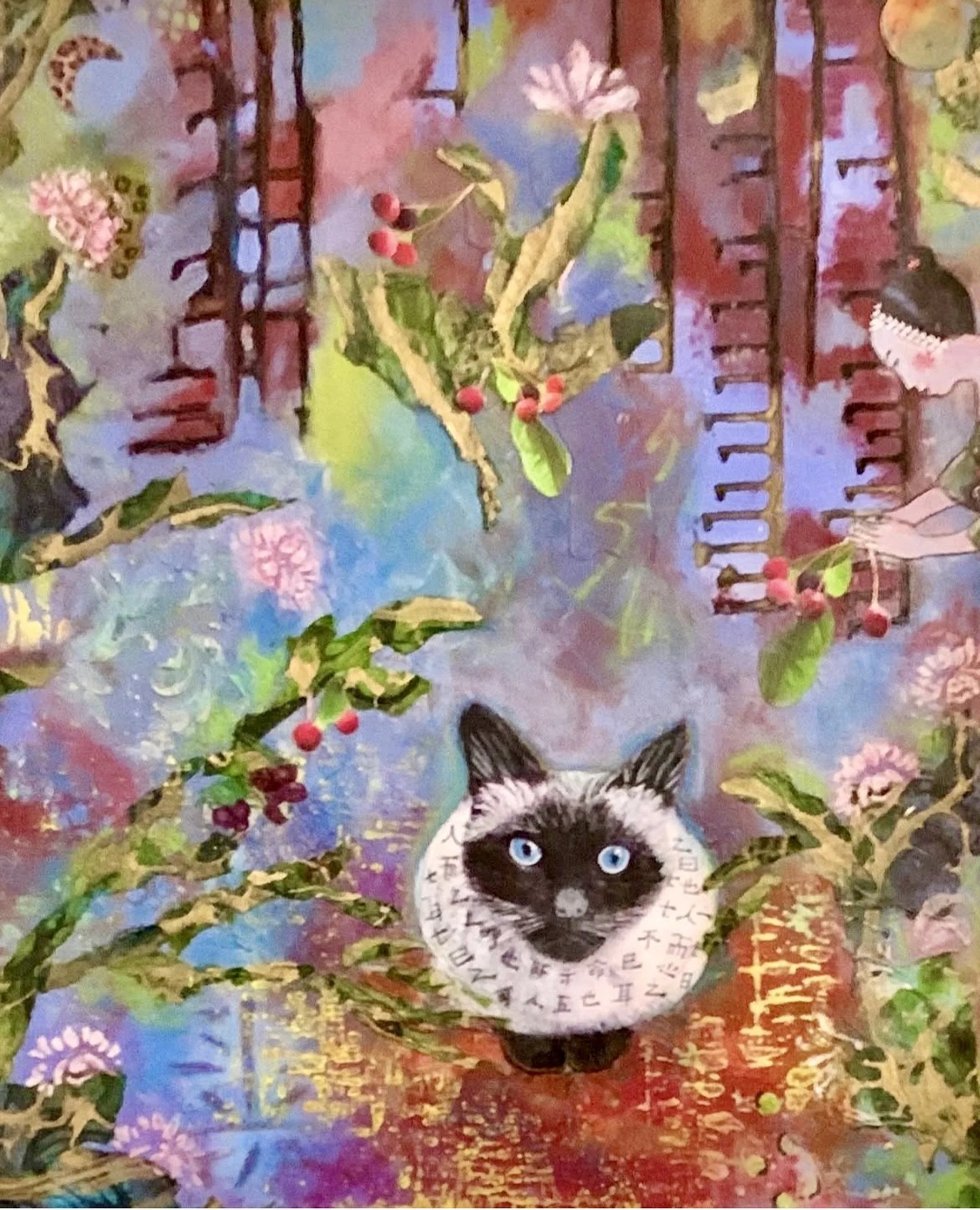 A colorful mixed media artwork featuring a Siamese cat with bright blue eyes at the center, surrounded by branches with pink flowers and red berries. The background includes a blend of blue, purple, and red hues with abstract elements and patterns.