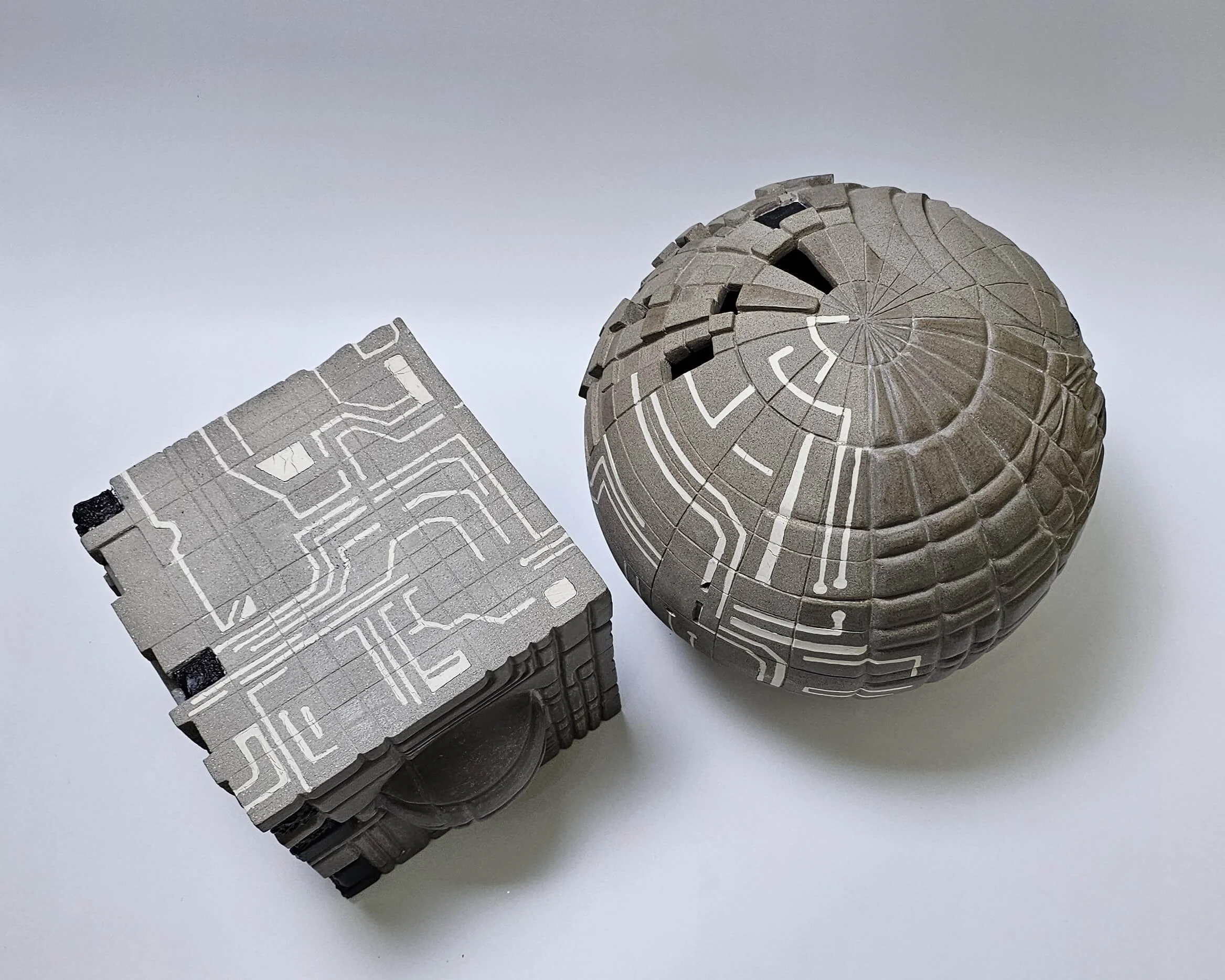 Who Owns Creativity? is a contemporary ceramic sculpture exploring questions of authorship, creation, interpretation, and shared meaning through clay and form.