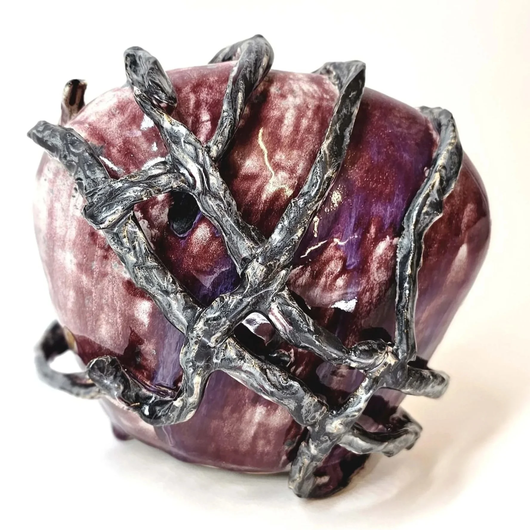 uncaged 2025

stoneware, multiple glazes
19 × 12 × 19cm


Sometimes, the deepest embrace isn't found in holding on, but in breaking free within the love that binds us.