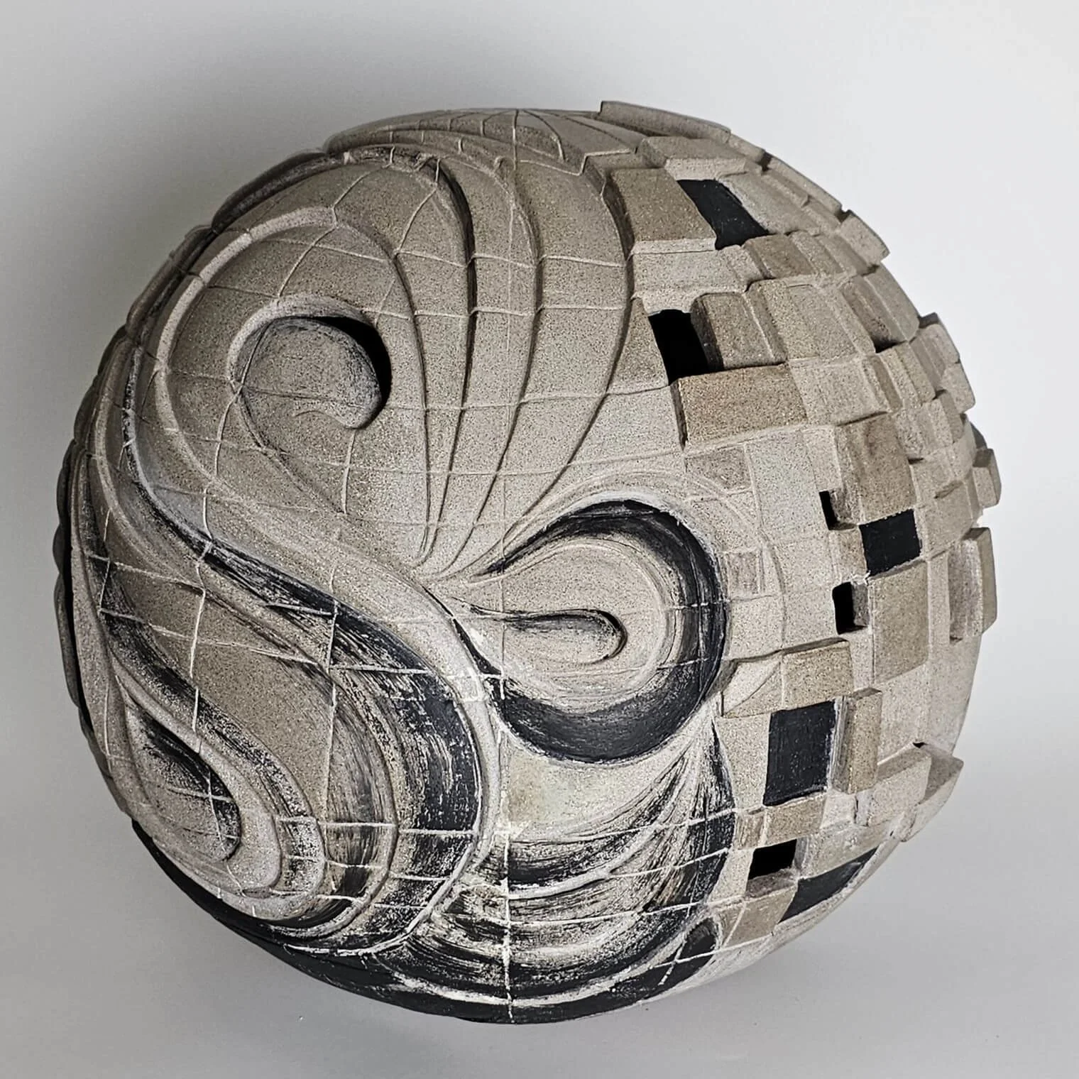 Conceptual ceramic artwork composed of handcrafted forms inviting reflection on creativity and meaning.