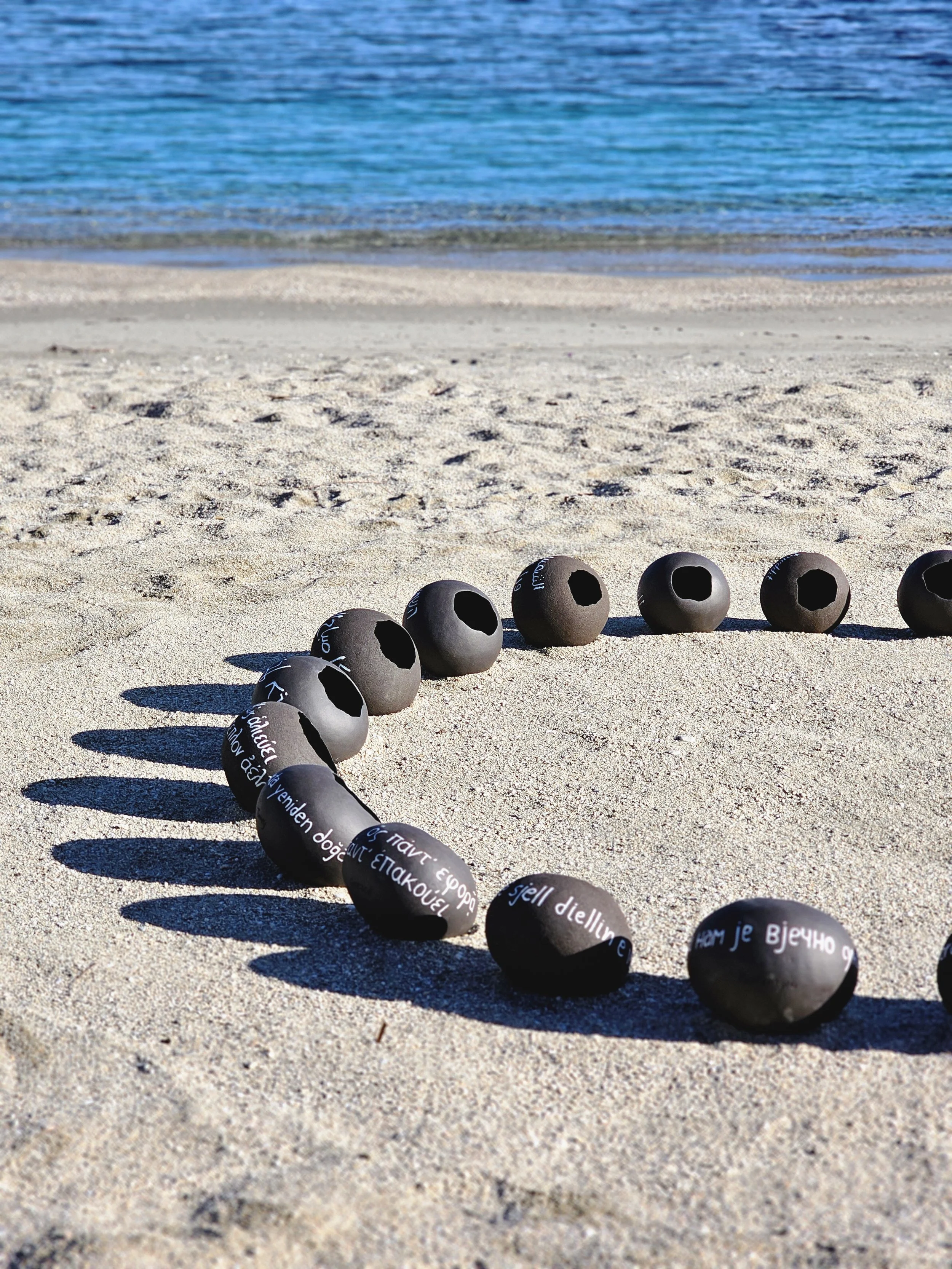 Circular ceramic installation inspired by Mediterranean nations and collective memory