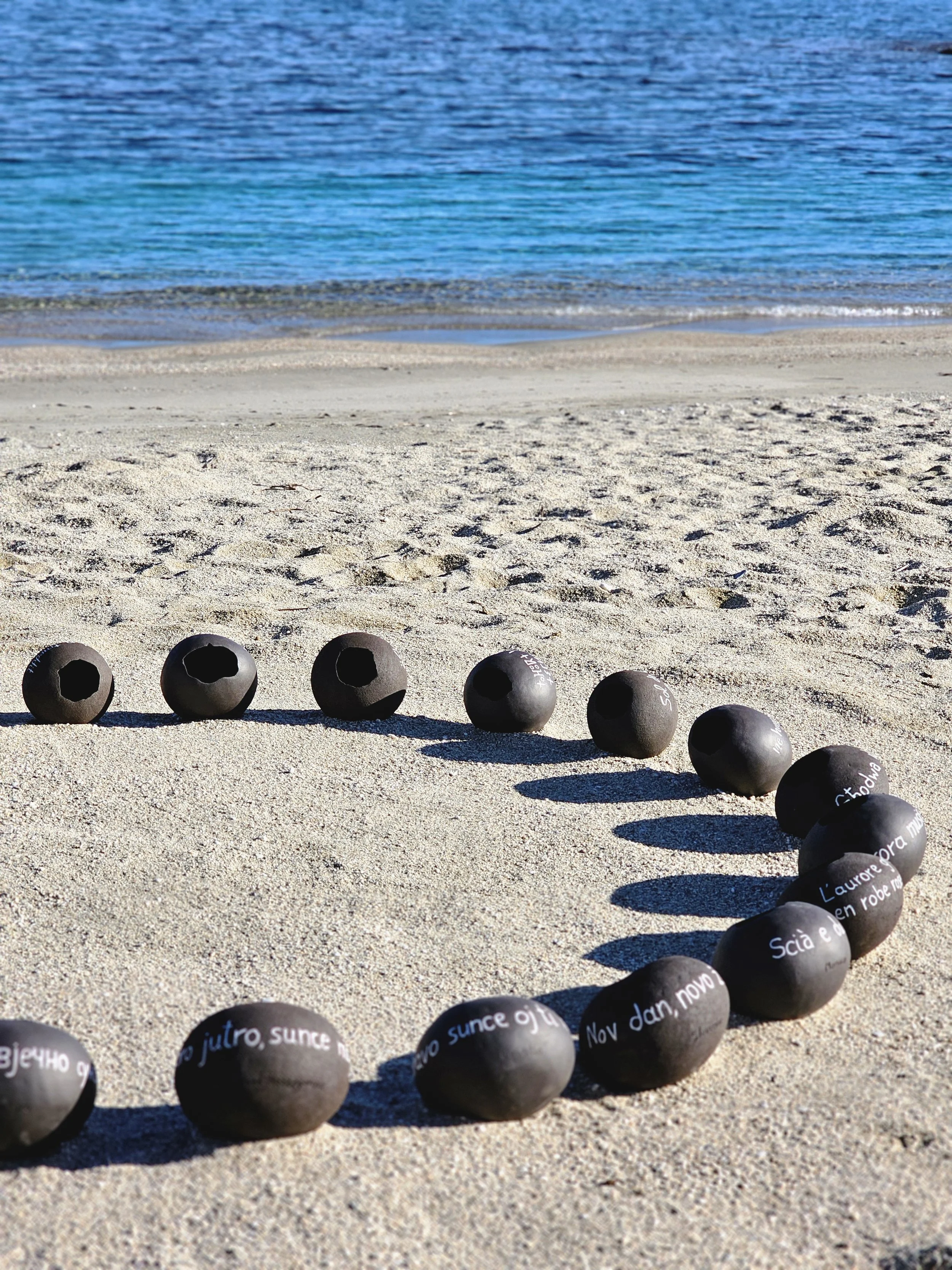 Circular ceramic installation inspired by Mediterranean nations and collective memory
