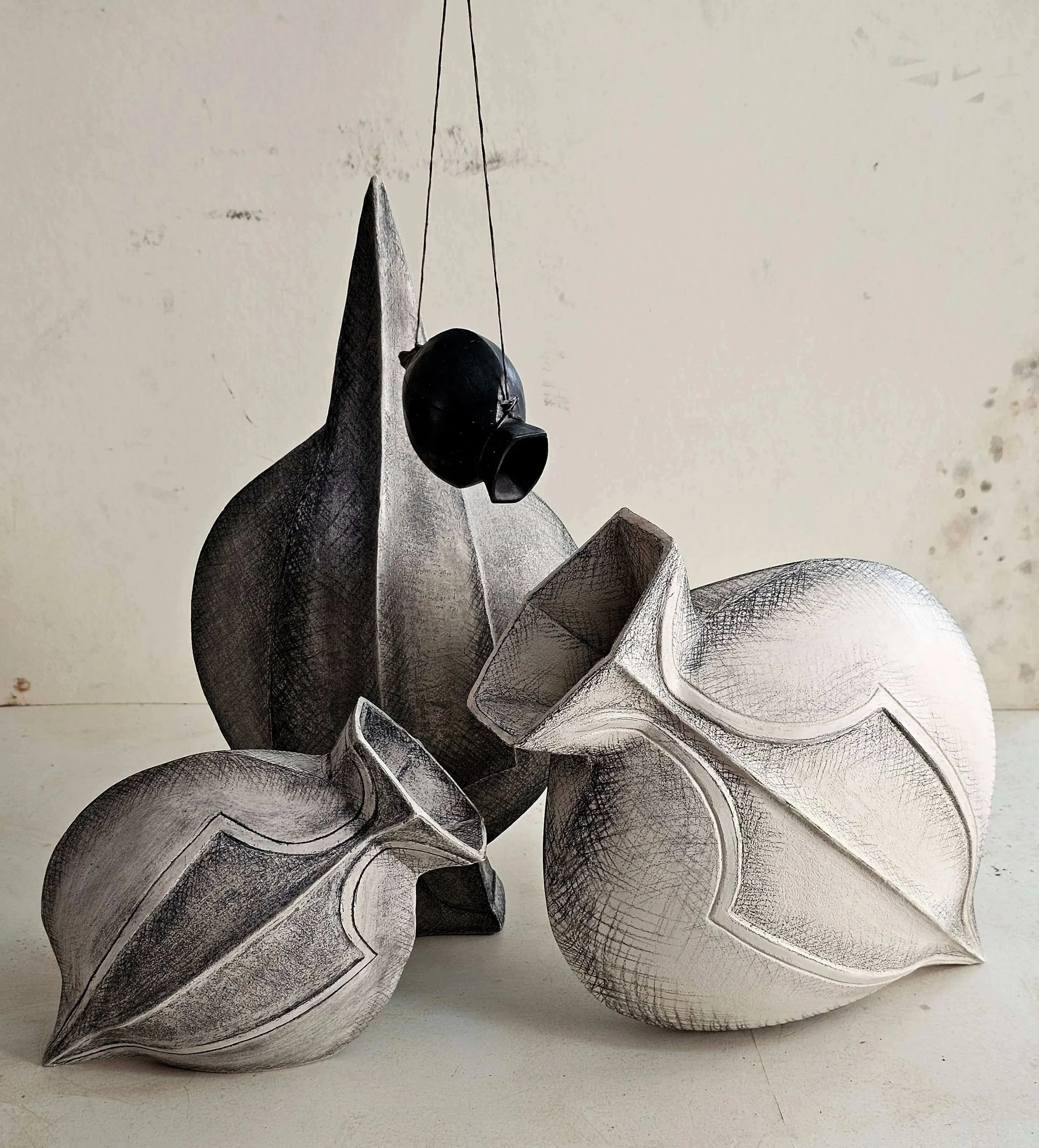 Perpetual Current is a contemporary ceramic sculpture exploring movement, transformation and the continuous flow of existence through hand-built stoneware forms.artistic sculptures, with detailed line work and shading.