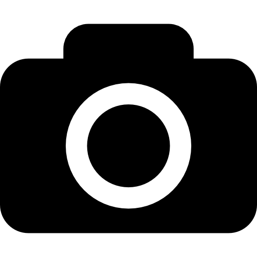 A simple black icon of a basketball with white lines.