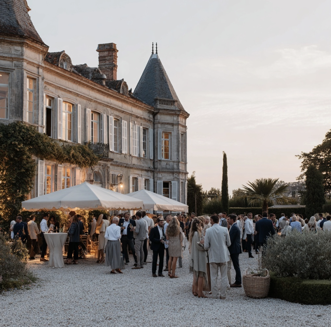 Outdoor wedding reception at a French chateau for a destination wedding