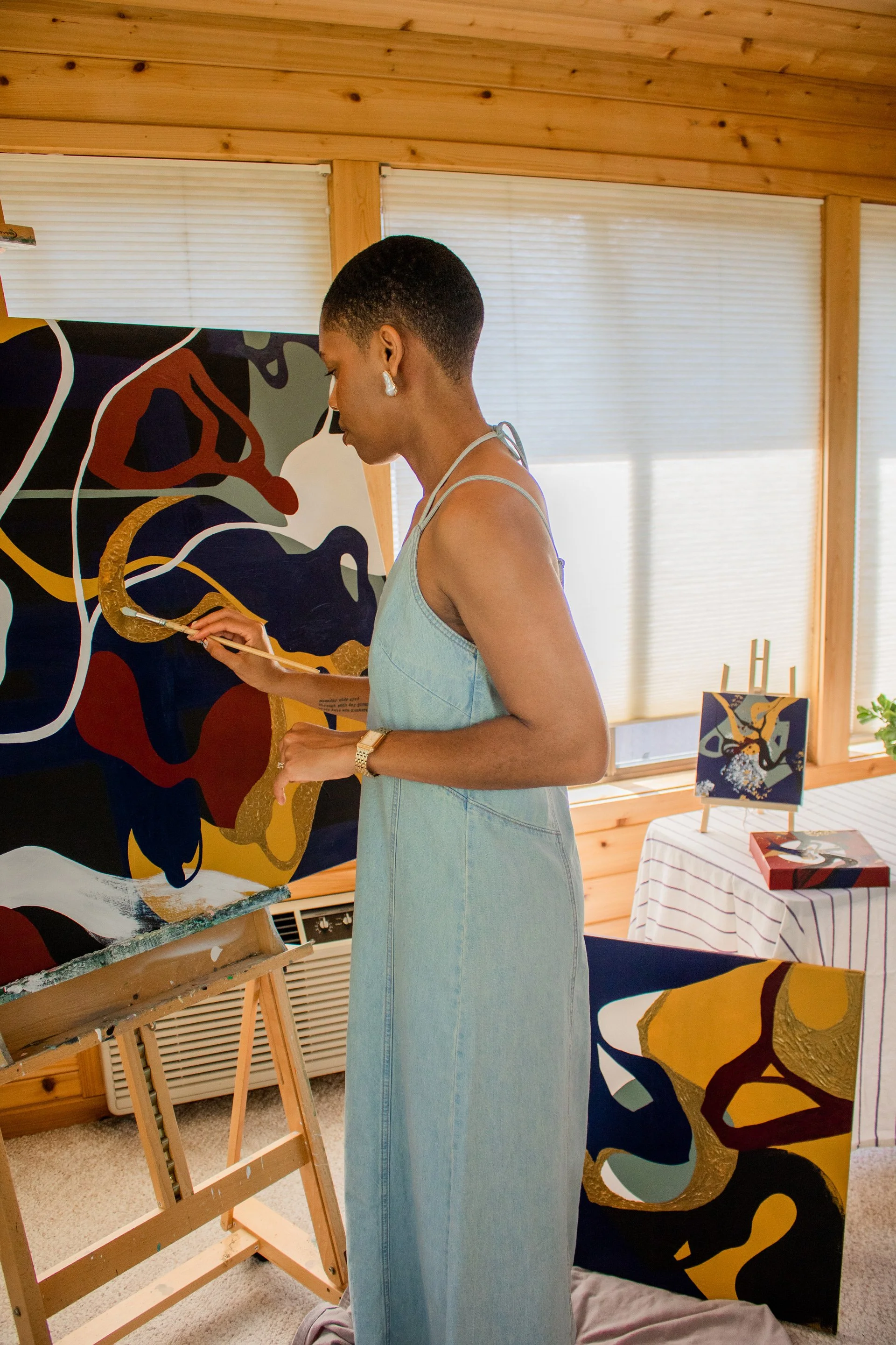 Minnesota abstract artist Nailah Ali creating work from the Moments in Grief collection, an original series exploring grief, healing, and transformation through abstract painting.