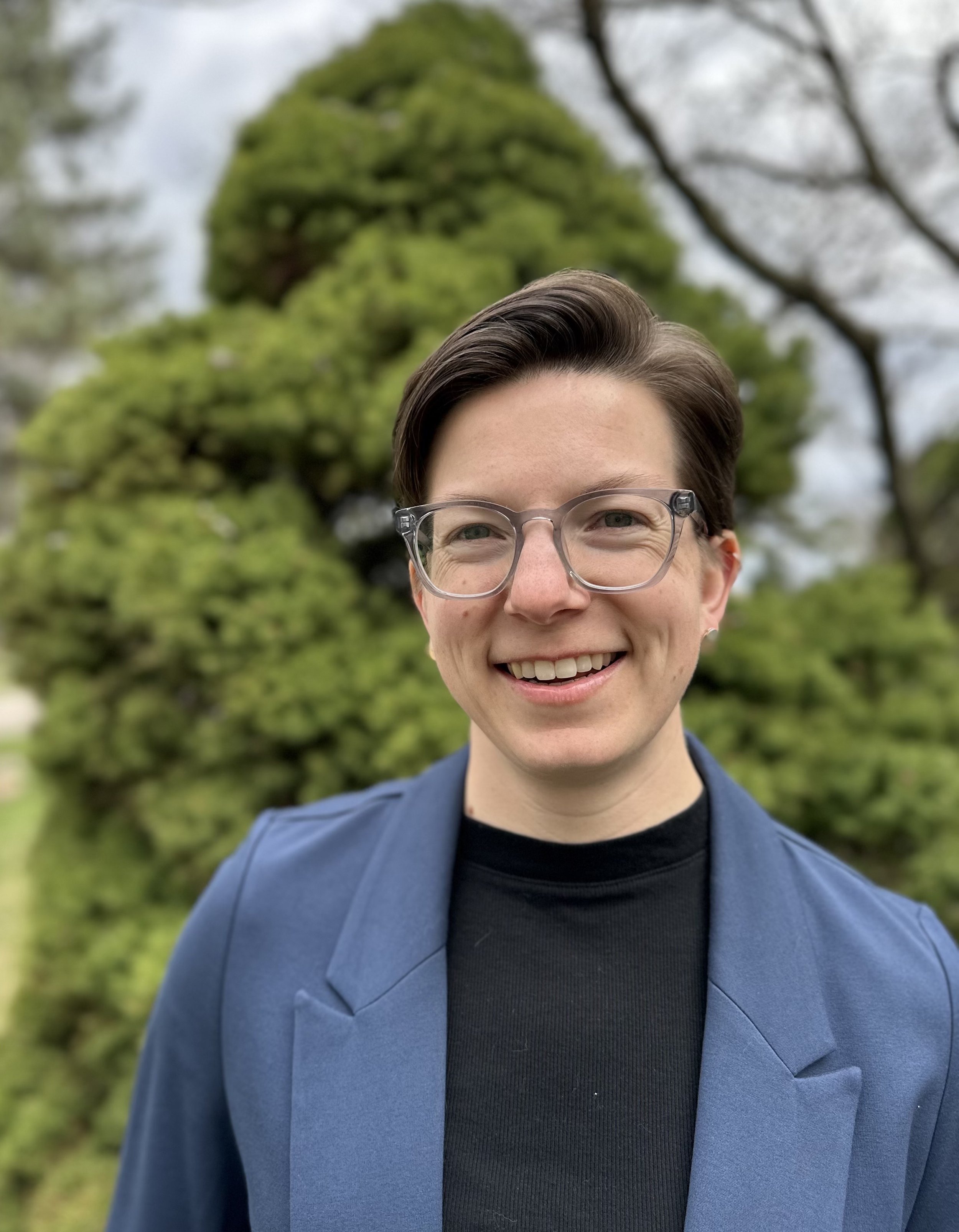 Headshot of the company's founder, Dr. Lauren Mullenbach