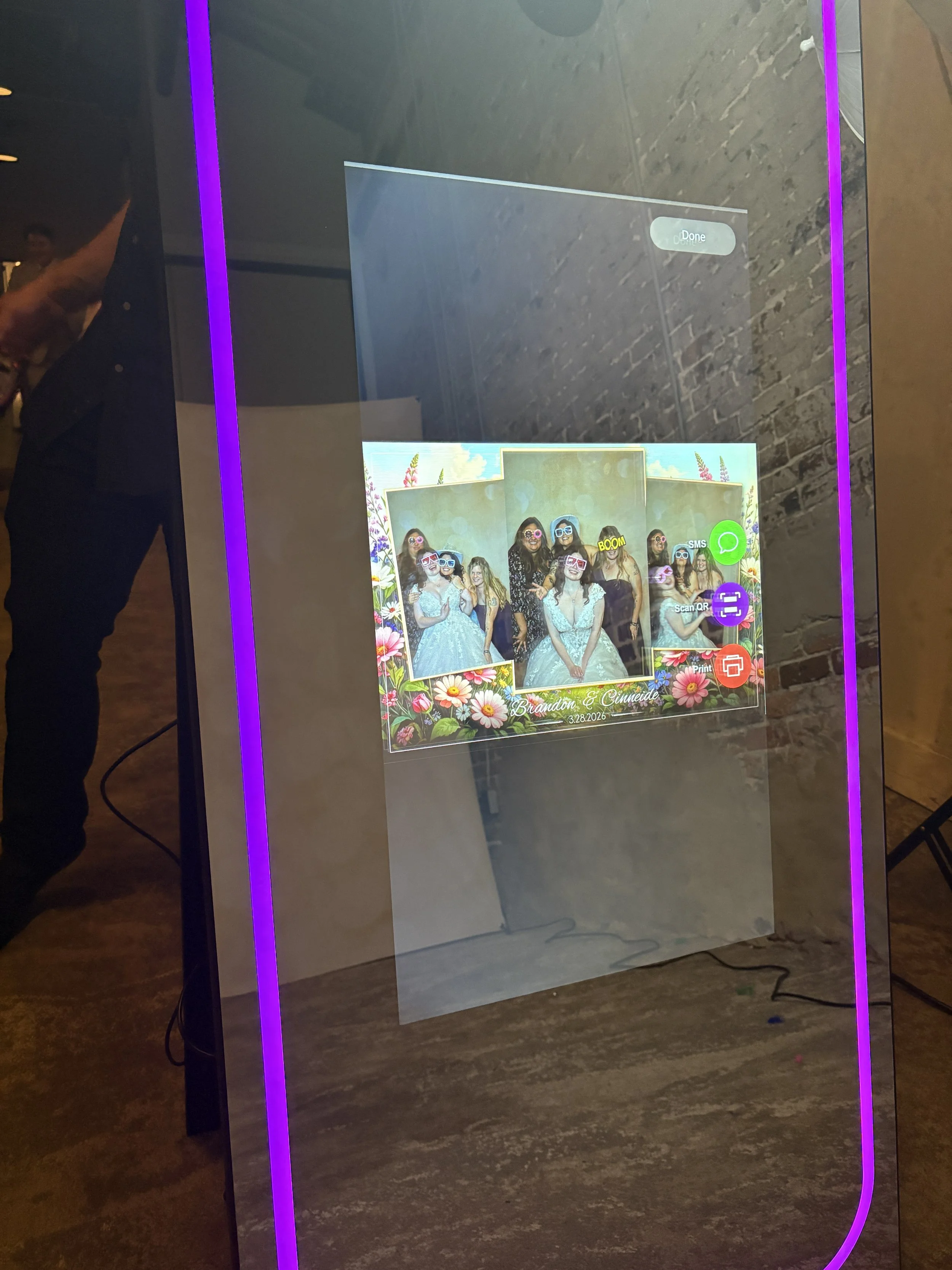 Bride and groom fun with strike photobooth! At their wedding in wilmington NC.