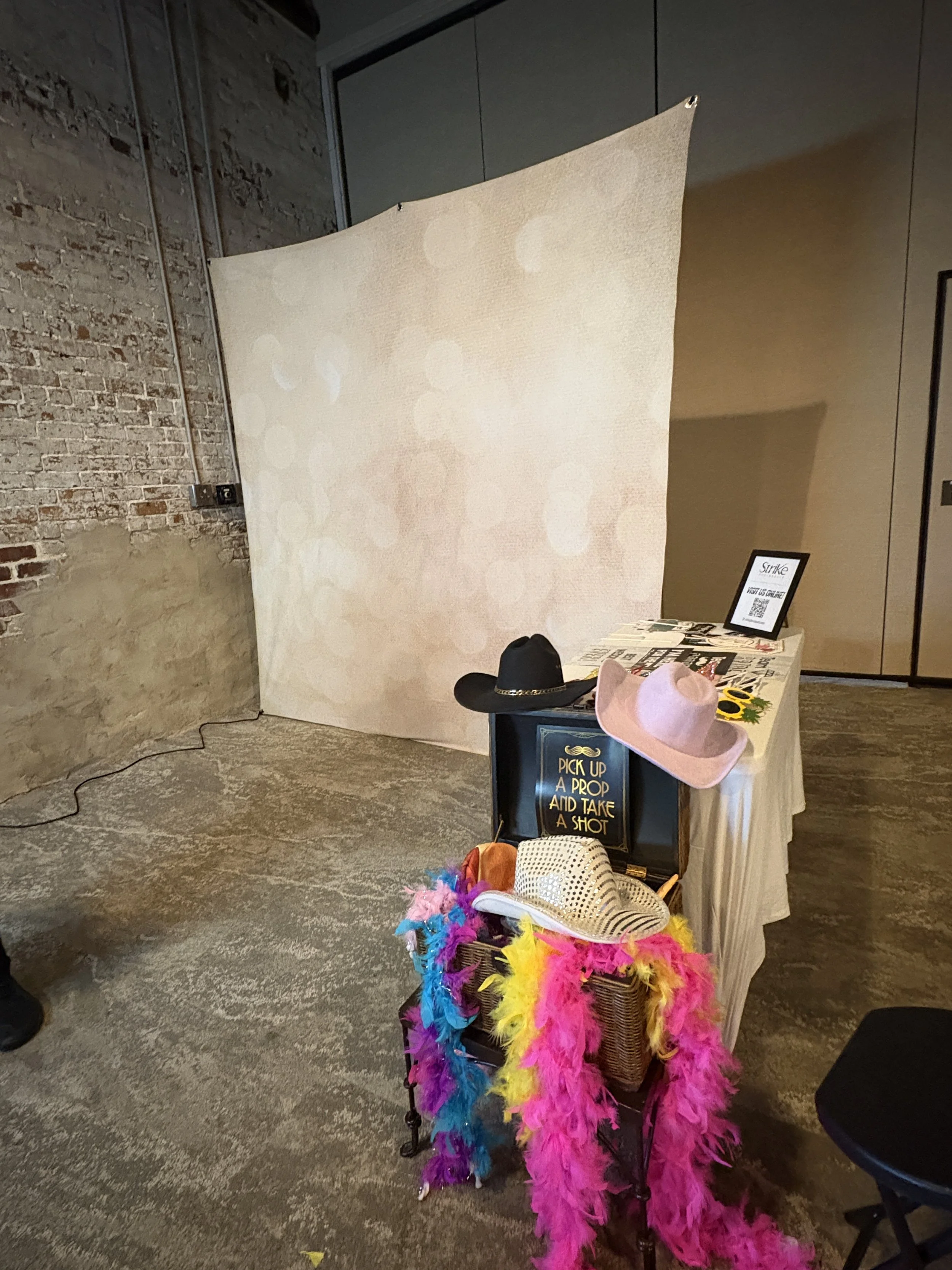 Champaign gold backdrop and props setup to have fun for the mirror photobooth! At the a loft covention center in Wilmington NC