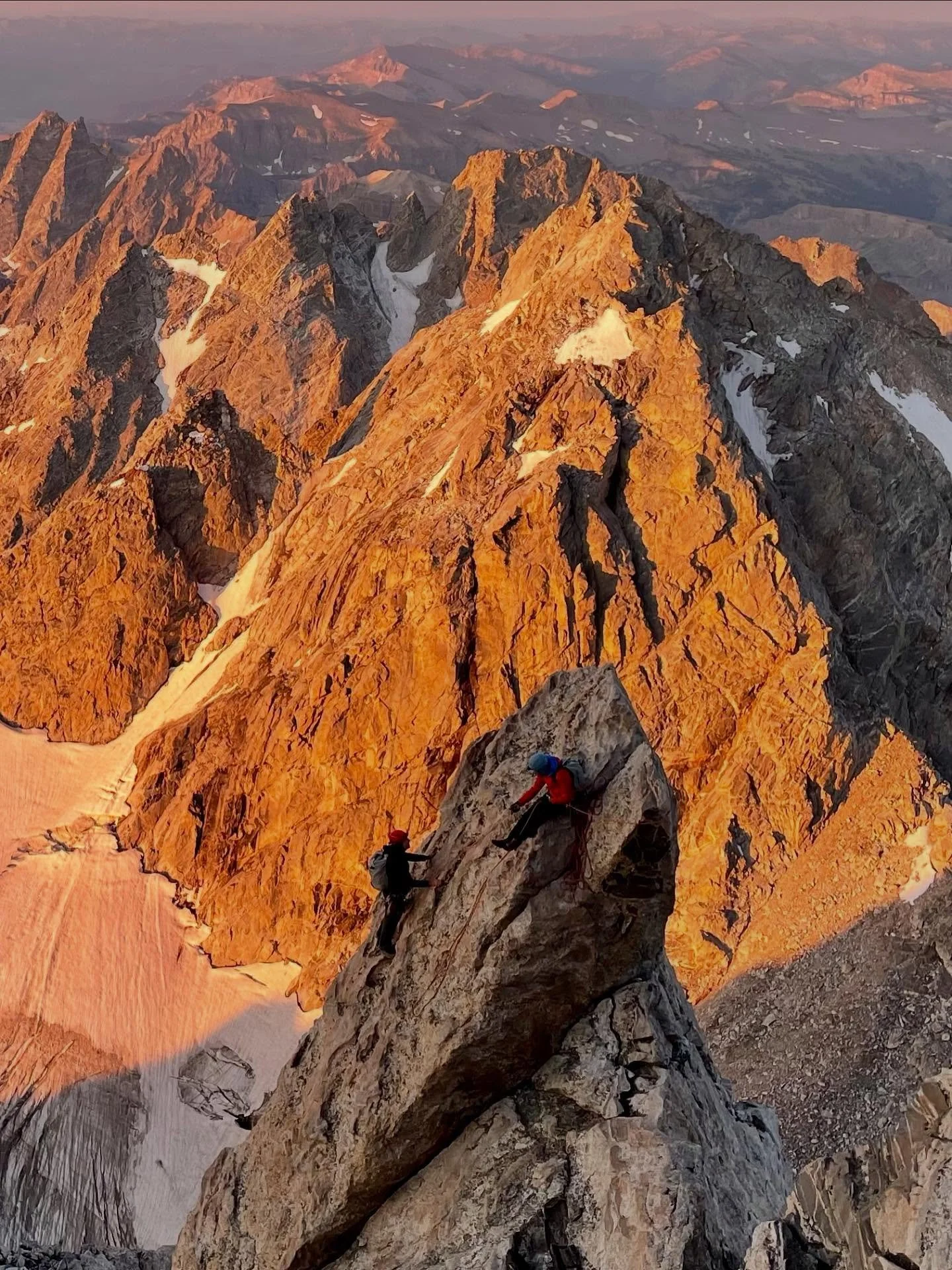 Someone snagged this shot of my man Bob and myself on top of Carmans Pinnacle. It was a fine morning on the Upper Exum Ridge, Grand Teton. 08.13.2025.

Also, I finally got a website up. Check it out: kylehornorguiding.com. 

Get in touch if you want 