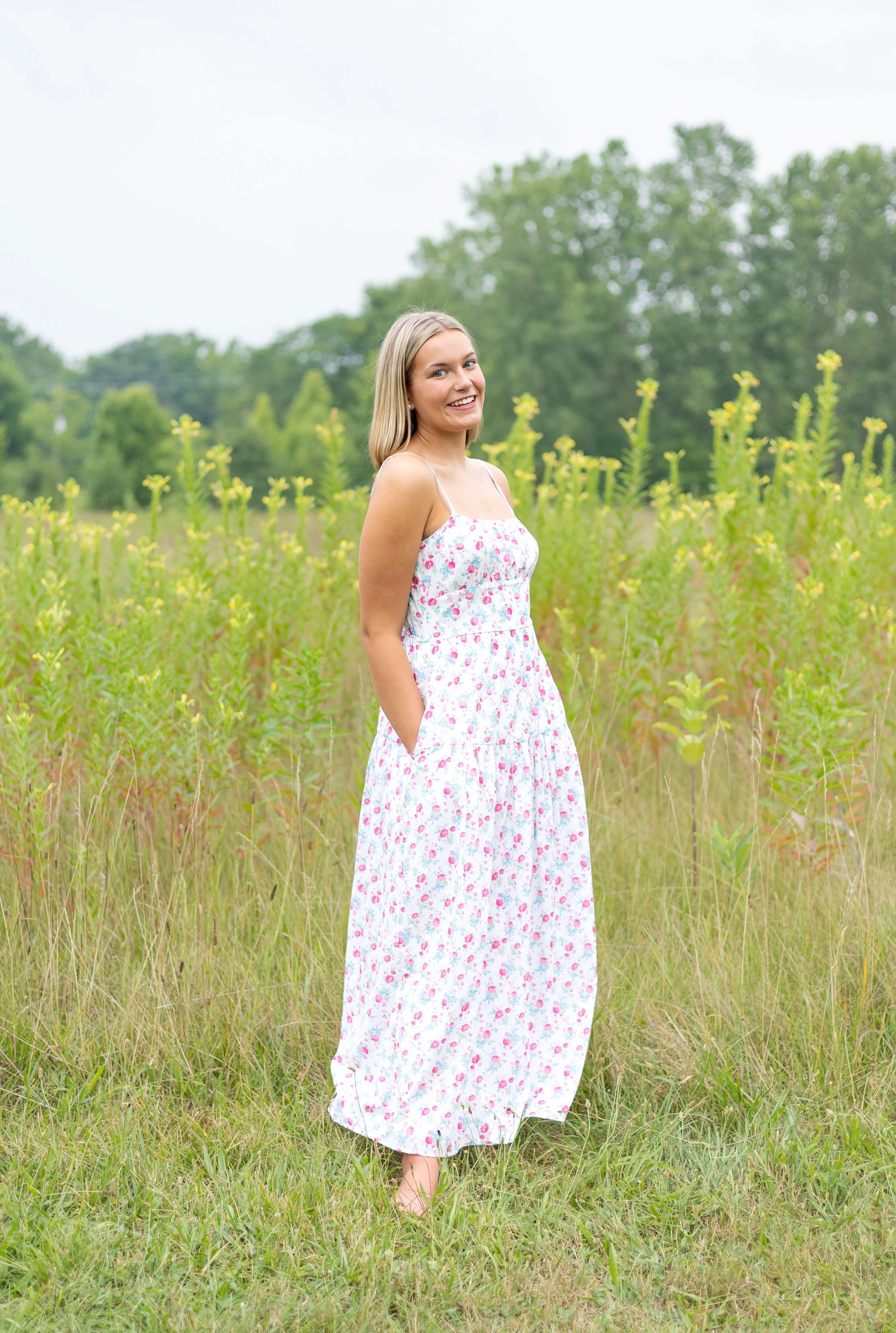 Senior with dress in floral fields at Huntington park