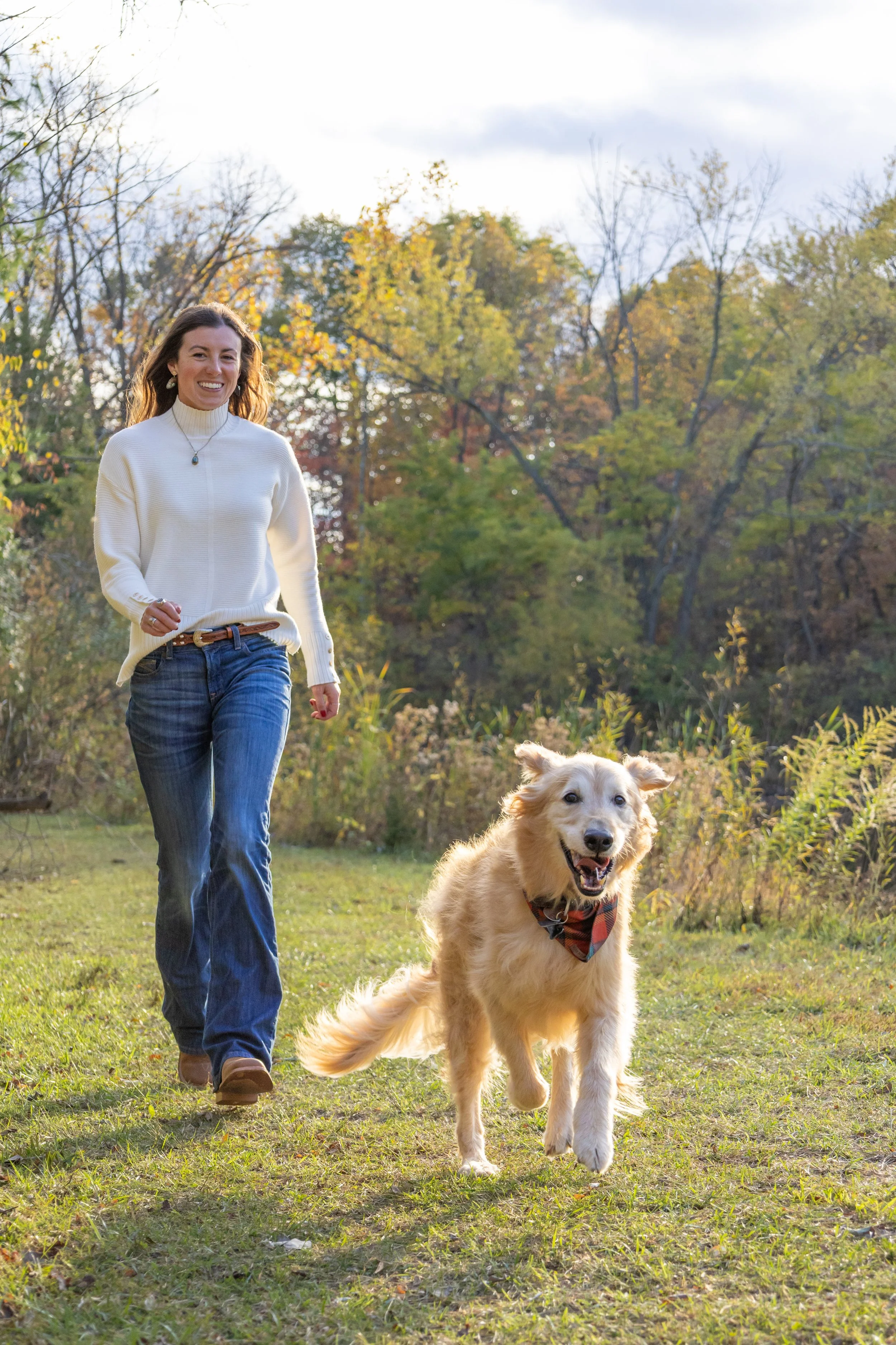 dog and mom running and playing photographed at a park near homestead in fort wayne