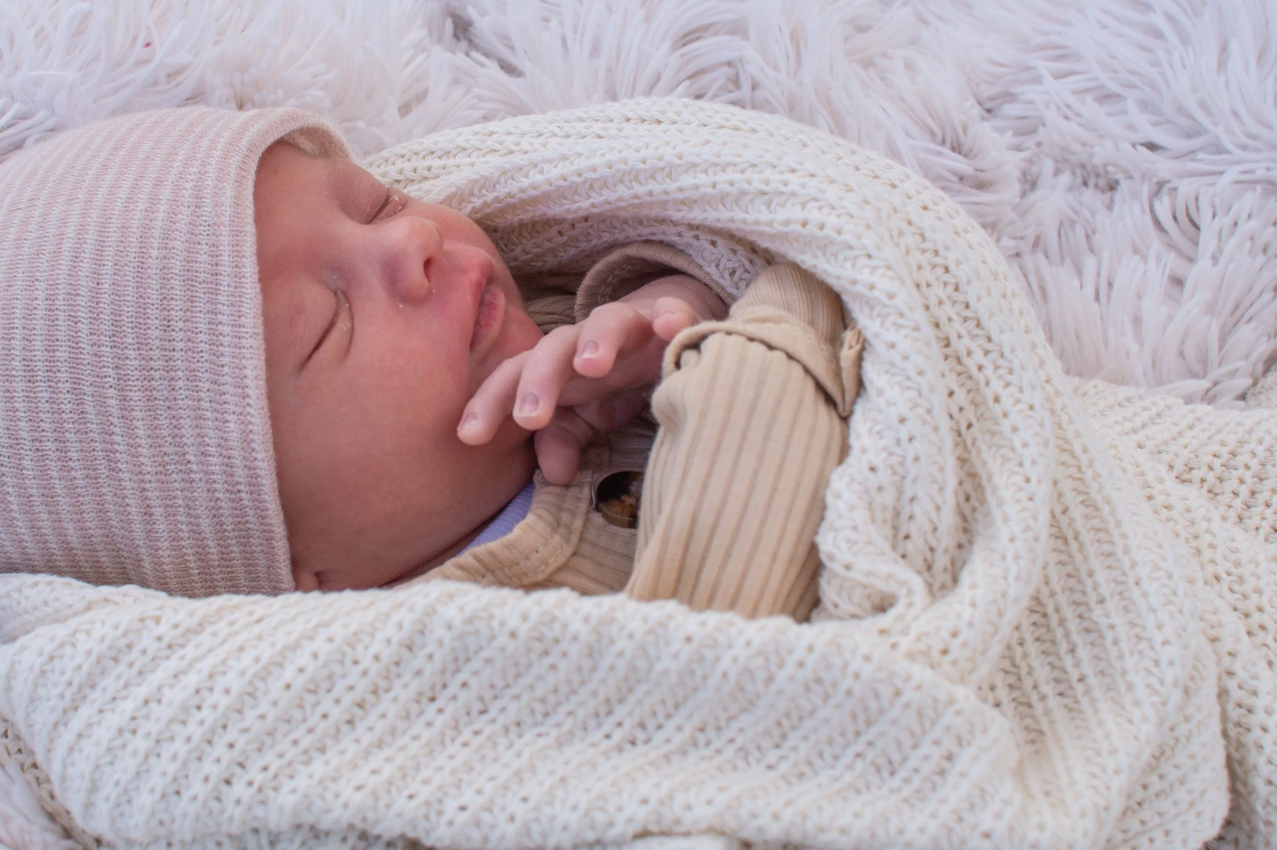 Baby in blankets taken by Inspired Photography in Huntington Indiana