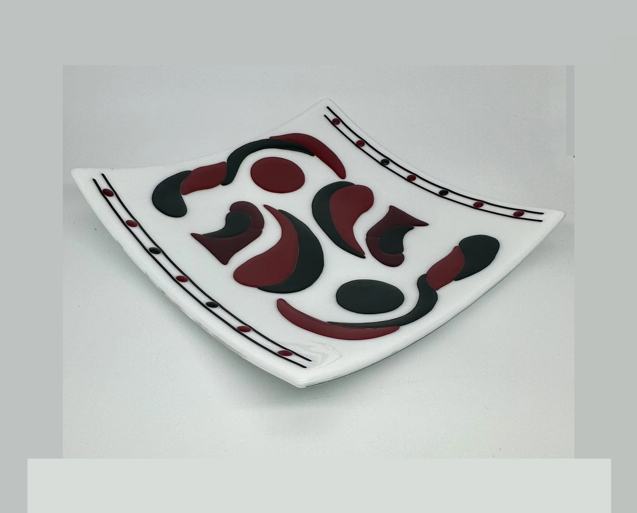 White dish red and black design.jpeg