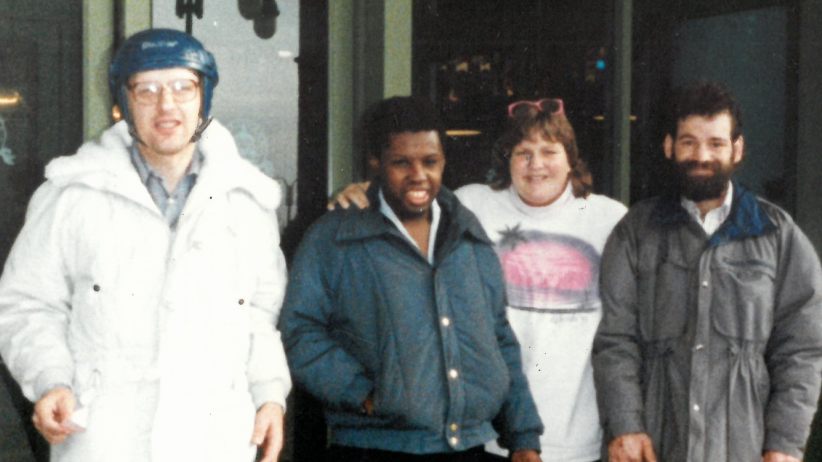 Archival 1989 photo of staff and participants standing together outside the Crossley location, reflecting early community-based support and connection at the Epilepsy Center of Northwest Ohio.