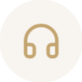Icon of beige headphones on a light background.