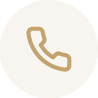 Icon of a beige telephone receiver on a white background.
