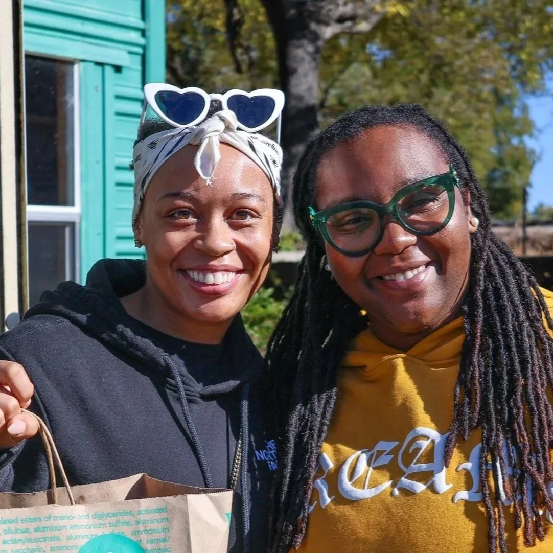 Geometric drawing of an outline square with sections divided by vertical, horizontal, and half circle lines.