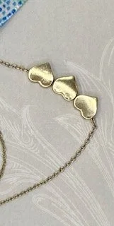 Three Heart Gold Tone Necklace