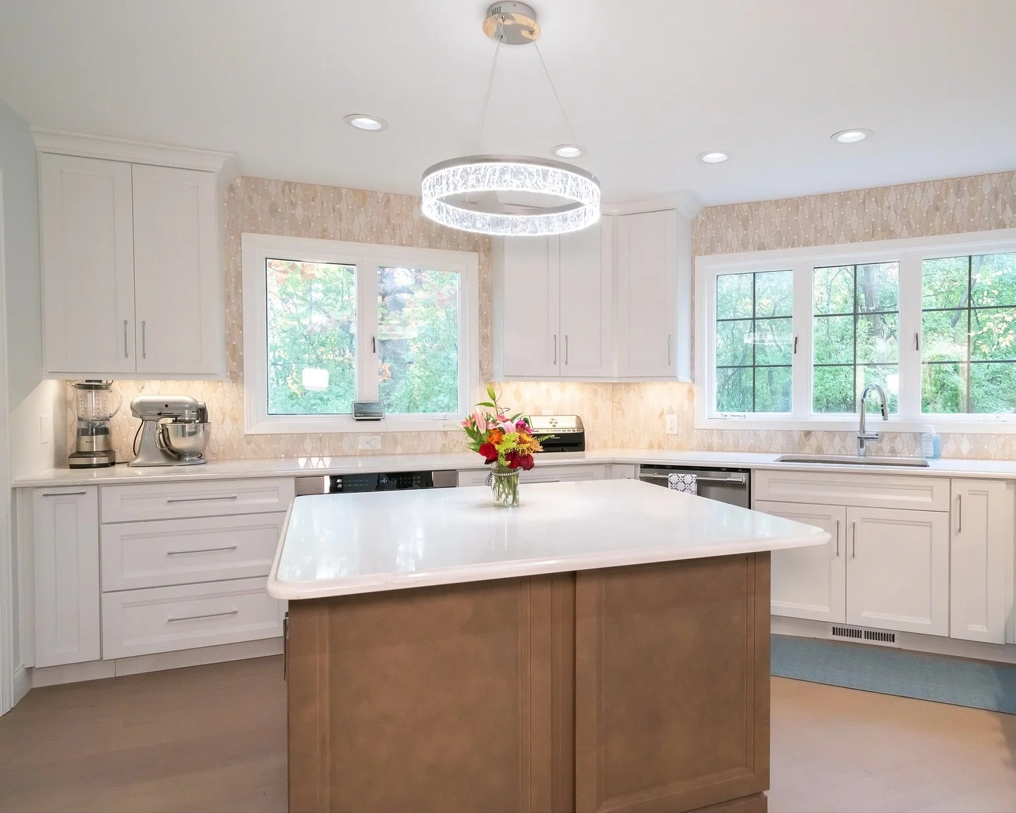 This Twin Cities remodel was all about balance and personality. The homeowners came to us with a clear vision of a luxurious, cohesive design filled with shades of blue and gray inspired by their Florida roots.

The challenge was to incorporate those