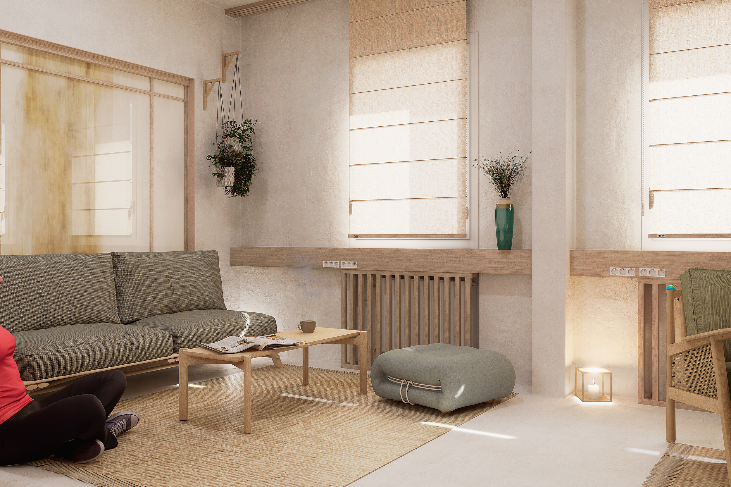 Salon lumineux avec canapé gris, fauteuil beige, tapis en jute, tables en bois, plantes en pot, fenêtre avec stores, bougie dans une lanterne, personne assise par terre.